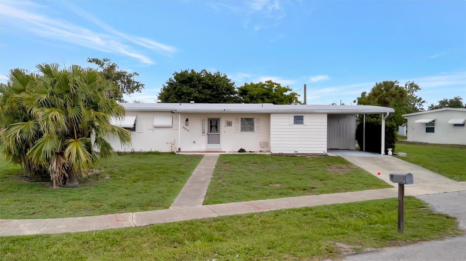 Charming Port Charlotte home packed with potential with remodeled kitchen, new plumbing and electric throughout and so much more! This 2-bedroom, 1-bath home offers nearly 1,000 square feet of living space and sits on an oversized corner lot in a convenient central location. Inside you'll find a bright living area, dedicated dining space, functional kitchen, interior laundry, and a screened lanai perfect for enjoying Florida?s sunshine year-round. The attached carport includes additional storage, while the spacious yard offers plenty of room for gardening, entertaining, or future enhancements. Solid block construction and classic Florida character make this an excellent opportunity for first-time buyers, seasonal residents, or investors. Conveniently located near shopping, dining, parks, medical facilities, and just a short drive to Charlotte Harbor waterfront access, boating, and Gulf beaches. A great value with room to make it your own!