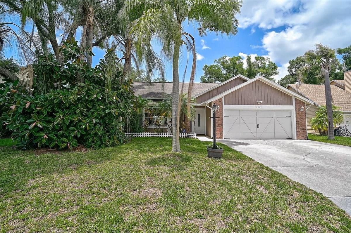 Welcome to Cedar Creek, one of Sarasota's most sought-after communities, where tree-lined streets, mature landscaping, and an unbeatable location create the perfect place to call home. This beautifully maintained 4-bedroom, 2-bath pool home combines modern updates with comfortable Florida living.
Step inside to discover an open-concept floor plan filled with natural light, soaring ceilings, fresh interior paint, and stylish plank tile flooring throughout the home. At the heart of the home, the fully renovated kitchen shines with elegant quartz countertops, crisp white cabinetry, and an inviting layout that seamlessly connects to the living and dining spaces—ideal for everyday living and entertaining alike.
Designed with privacy in mind, the split-bedroom floor plan offers a peaceful retreat for owners and guests. The spacious primary suite features direct access to the lanai, a generous walk-in closet, and an ensuite bath with a large walk-in shower.
Multiple sliding glass doors from the family room, dining room, and primary suite open to the expansive screened lanai, creating a true indoor-outdoor lifestyle. Relax under the covered seating area, take a refreshing swim in the sparkling pool, or enjoy the privacy provided by lush tropical landscaping that surrounds the outdoor living space.
This home has been lovingly maintained and thoughtfully updated, including a newer roof (2021), A/C (2018), newer pool pump (2026), and recently replaced lanai screens, offering peace of mind for years to come.
Residents of Cedar Creek enjoy low HOA fees, no CDD fees, and a prime location just minutes from UTC shopping and dining, Nathan Benderson Park, Lakewood Ranch, Sarasota-Bradenton International Airport, world-class golf courses, downtown Sarasota, vibrant arts and entertainment venues, and the area's renowned Gulf Coast beaches.
Move-in ready and perfectly positioned in the heart of Sarasota, this exceptional pool home offers the lifestyle you've been searching for. Schedule your private showing today!