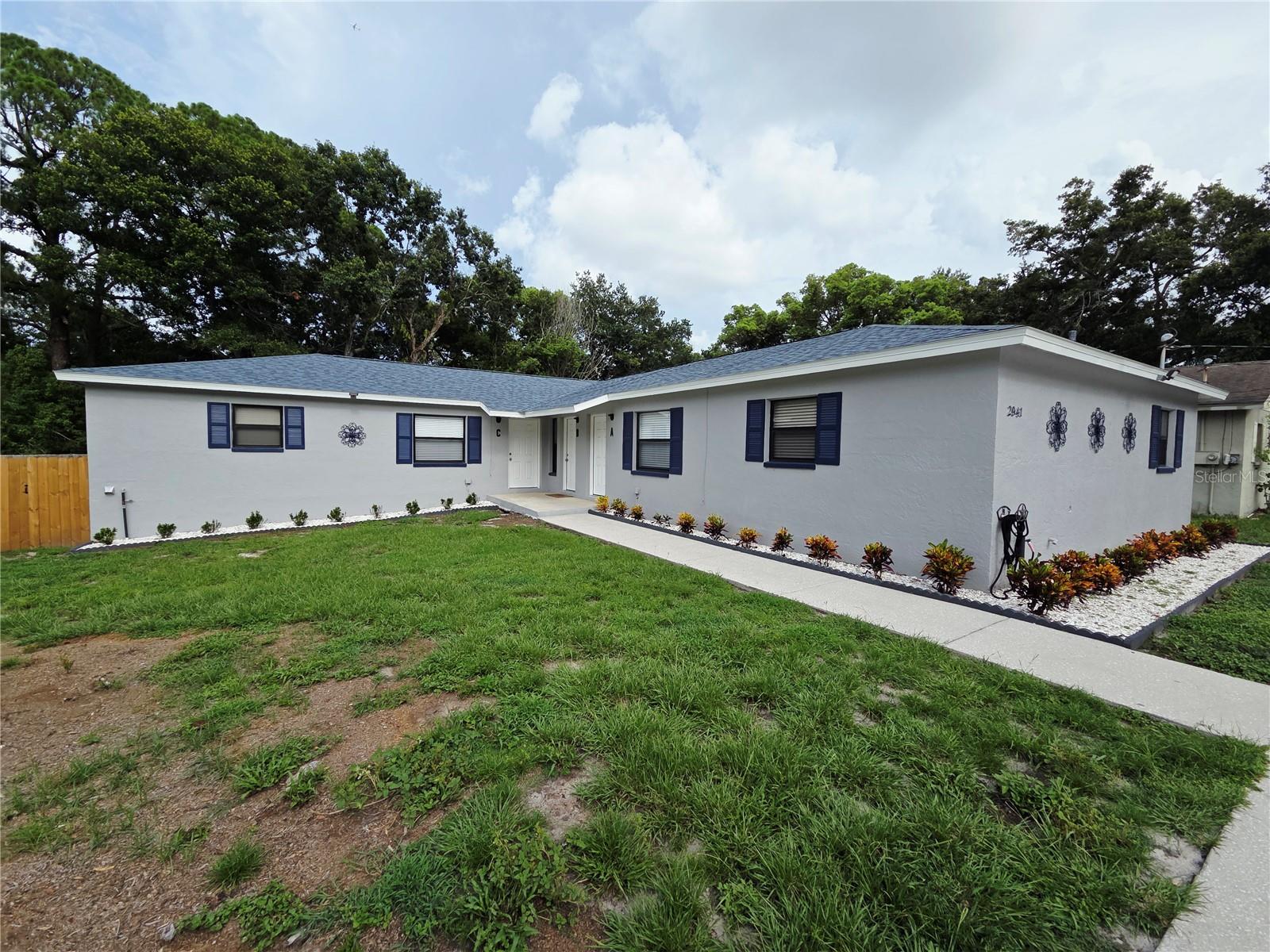 Virtually Staged. Located in a private 3 unit building, villa style living, fenced yard!  LOCATION, LOCATION, LOCATION! 5 minutes from DOWNTOWN SAFETY HARBOR & PHILIPPE PARK! If you like to hear the word NEW, this home is for you. Be the first to live in this Spacious and completely remodeled 2-bedroom, 1-bath residence, just completed with no detail spared. Located at the end of a multi million dollar single family homes, on a beautiful cul-du-sac street. This light and bright home features a modern open-concept floor plan with luxury vinyl flooring, recessed lighting, and ceiling fans throughout. The upscale kitchen offers granite countertops, dishwasher, garbage disposal, ice maker, and all-new stainless-steel appliances. The spa-inspired bathroom has been fully updated with high-end finishes. Additional highlights include inside washer/dryer hookups, a large fenced in backyard (shared), located at the end of a beautiful cul-du-sac street, and lawn care included. Zoned for Curlew Creek, Safety Harbor Middle, Countryside High School. Shed storage available for an additional monthly fee. Conveniently located near downtown Safety Harbor shops, dining, marina, and Safety Harbor Resort & Spa. Move-in ready and available for immediate occupancy.