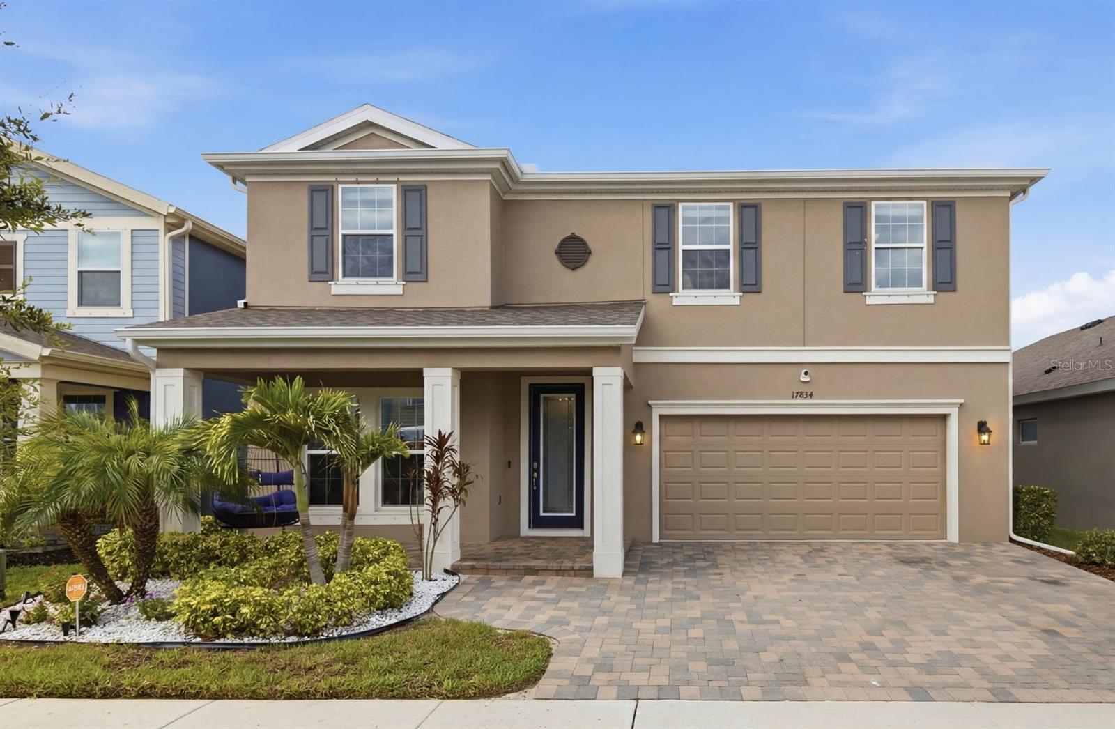 Perfectly positioned on one of Bexley’s most exceptional homesites, this Homes by WestBay home, built in 2023, captures expansive water and conservation views from nearly every room. Natural light fills the home, while the views create a setting that feels peaceful and private.

At the heart of the home, the oversized island kitchen features extensive cabinetry, generous prep space, and an effortless connection to the great room and dining area, making it the natural gathering place for everyday living and entertaining. A private home office on the main level provides a quiet place to work or study.

Upstairs, a spacious loft is complemented by three additional bedrooms and the owner’s suite, where the water and conservation views continue. The spa-inspired bath features dual vanities, a soaking tub, a spacious walk-in shower, and an impressive walk-in closet.

Designed to make the most of the exceptional setting, the screened lanai and extended paver patio extend the living space outdoors. The fully fenced backyard provides plenty of room to play, entertain, or simply enjoy the peaceful surroundings, with expansive water and conservation views creating a backdrop that’s both private and picturesque.

Additional highlights include a striking electric fireplace, fresh interior paint, an epoxy-coated garage floor, overhead garage storage racks, and a garage prewired for a Tesla charger. Tasteful finishes throughout complete the home.

Life in Bexley is about more than beautiful homes. Miles of scenic trails connect parks, playgrounds, dog parks, open green spaces, and resort-style amenities throughout the community. The Bexley Club serves as the heart of the neighborhood with a state-of-the-art fitness center, game room, year-round community events, and the popular Twisted Sprocket Cafe. Top-rated schools, everyday conveniences, and quick access to the Veterans Expressway make it easy to enjoy everything Tampa Bay has to offer while coming home to one of the area’s most sought-after master-planned communities.