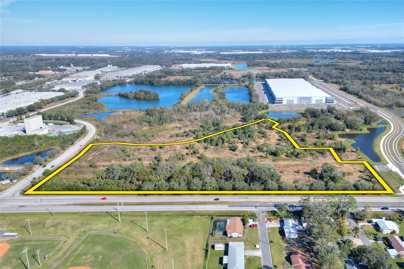 This prime parcel of raw land, located in the heart of Plant City, presents an outstanding opportunity for developers looking to build-to-suit in a rapidly growing area.  Zone PD with a future land use designation of MU-R/C/I (Mixed-Use Residential, Commercial, and Industrial), the property offers unparalleled flexibility.  With over 1,200 feet of road frontage on Park Road, and easy access to I-4 and Hwy 60, this location boasts excellent connectivity to major transportation routes, offering both high visibility and convenient accessibility.  The combination of prime location and zoning flexibility makes this site ideal for a wide range of residential, commercial or mixed-use projects.  

The owner will consider dividing.