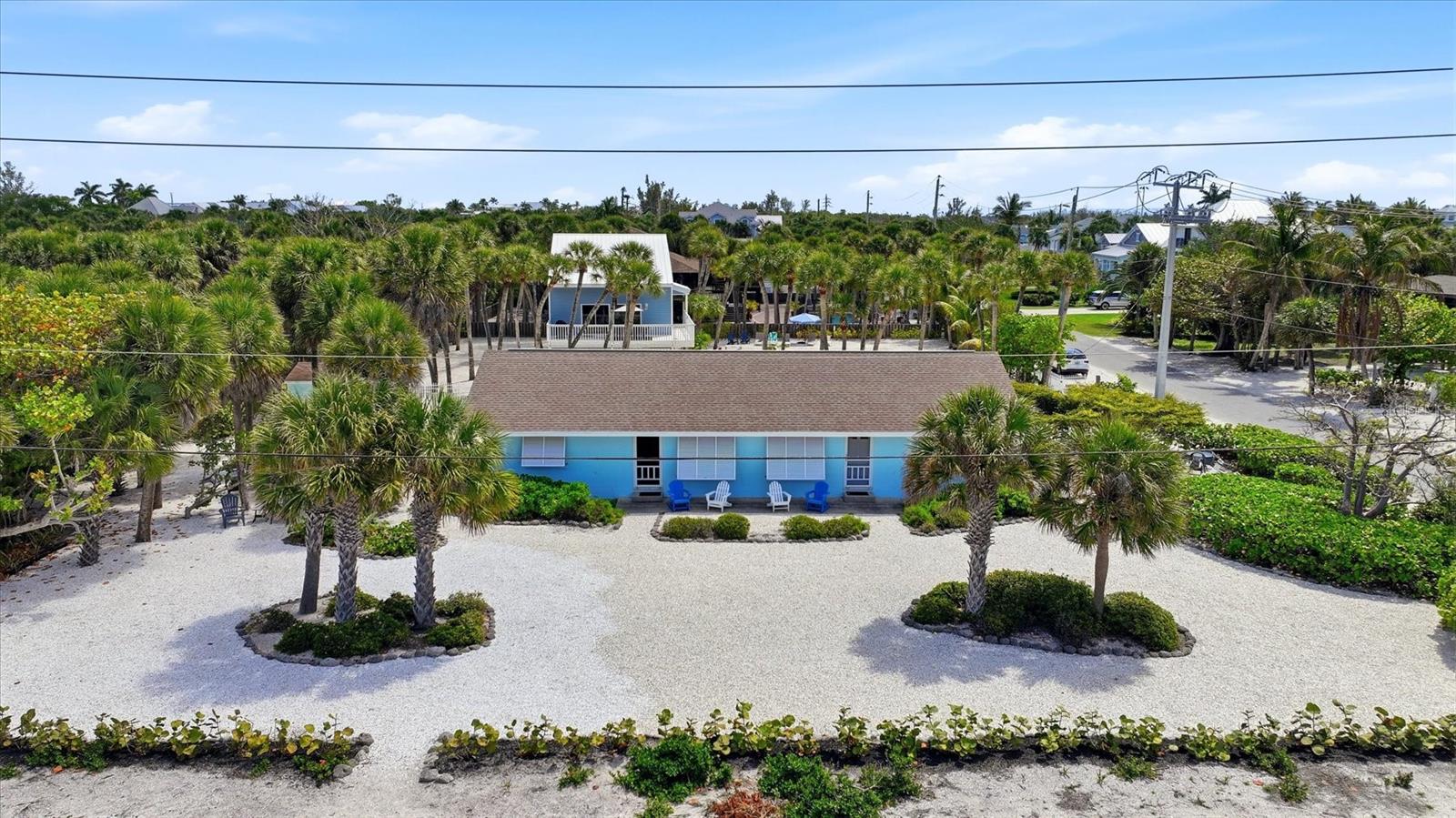 Exceptional redevelopment opportunity in one of Boca Grande’s most iconic settings. This 0.39-acre parcel is uniquely positioned with a state-owned corridor along the north boundary, adding privacy, openness, and light. To the west, enjoy a stable Gulf view corridor and the prominent presence of the iconic Gasparilla Island Lighthouse, creating a rare combination of scenery and identity. The existing duplex provides immediate use or rental income while planning your future luxury build. Few properties offer this blend of conservation adjacency, view protection, and landmark proximity—a scarce offering for buyers seeking a signature Gulfside homesite in a legacy location.