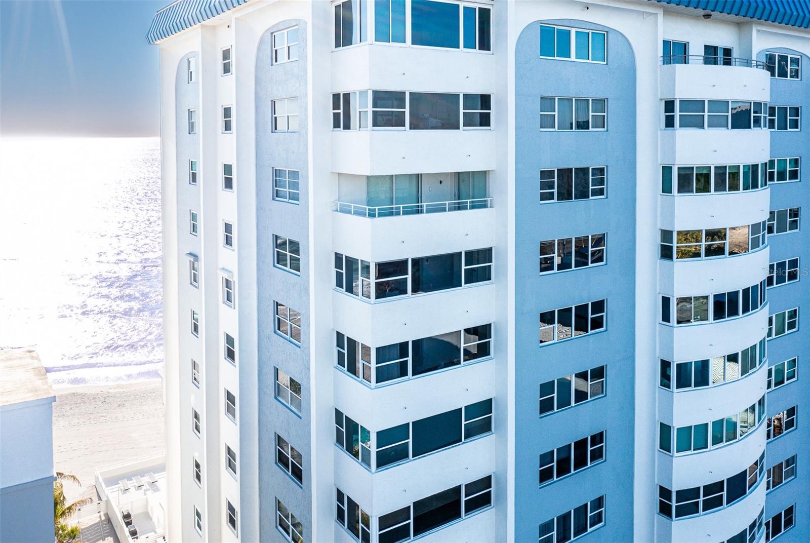 ****There is nothing left to do. Nothing to imagine. Completed in 2022, everything has been upgraded and transformed into the most modern luxury. This high-floor corner residence on Lido Beach in the Key South Tower building has been completely transformed—from ceilings to floors—into a home where every high-end creature comfort is already in place and water views unfold from every window. The building is so modern, so perfectly updated and completed that it even has its own hurricane/surge protection system surrounding the building-- unique and impressive. You must see this condo's extraordinary views in day and at night!!! 

****Panoramic vistas stretch across the Gulf of Mexico, Sarasota Bay, the Ringling Bridge, and downtown Sarasota, creating a constantly shifting backdrop of light, water, and skyline. Set within a Lido Beach building that has already been elevated to the highest modern building standards, this residence offers peace of mind. The HOA’s abundant reserves reinforce the sense of security -- owners love living here.
Inside, porcelain tile flows throughout, complemented by all-new ceilings and modern lighting that set a sophisticated, contemporary tone.

****The kitchen is both elegant and functional, featuring abundant new wood cabinetry, quartz countertops, and new appliances—designed for everything from casual mornings to elevated entertaining. The primary suite is a private sanctuary, framed by water views and finished with the finest luxury tile. It offers a walk-in closet, an ensuite bath with a walk-in shower, and thoughtful storage. The guest suite is equally impressive, with new tile, a walk-in closet, and beautiful views of the Intracoastal Waterway and downtown Sarasota. Spacious enough for a king bed, it also features its own walk-in shower, making it ideal for guests who appreciate comfort and privacy.

****Beyond the residence, Key Tower South has been fully reimagined, with the lobby and common areas completely renovated in 2025. Residents enjoy 220 feet of private Gulf frontage, a heated beachfront pool, expansive sundeck, direct beach access, saunas, a fitness room, library, bike storage, and on-site management—resort-level amenities without the crowds.

****This is not simply a condo. It is a fully realized beachfront lifestyle—elegant, effortless, and complete. Call now for a private showing. Prefer to experience it from afar?  Drone footage and immersive fly-throughs are available.