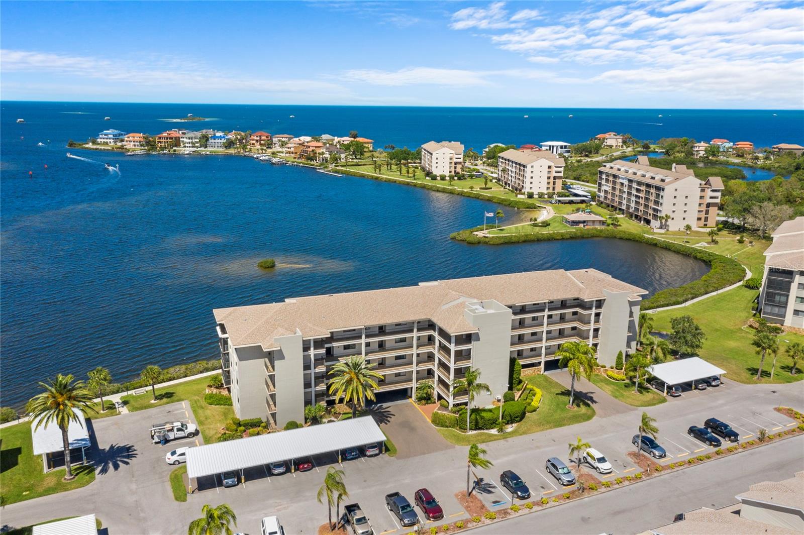 TOP FLOOR, PENTHOUSE, GULF FRONT condo available for SALE. Gated community with too many amenities to list. 24 hour manned gate, Community boat ramp, tennis, pickleball, clubhouse with fitness, library, game tables, card rooms, activities like yoga, book clubs, card groups, holiday events, putting green, waterfront boardwalk, car washing stations. Kitchen with laundry closet (in unit washer and dryer), kitchen with pass through to dining room. Living/dining combo with sliding door access to the lanai. Wet bar in living room. The back of this condo faces West directly over the Gulf of Mexico so it offers a magnificent view of the water from almost every room. Every gorgeous sunset is unique. Master bedroom has en suite bath, make up vanity, walk in shower, walk in closet, wall safe. Two single adjustable beds (can push together to be a larger bed). Sliding door access to lanai from master. Second bedroom has loveseat and desk. Loveseat does NOT pull out into bed. There is a foldable bed available for guests.  Guest bath with tub/shower. Extra features: Water filter at kitchen sink, plantation shutters in kitchen, TVs in living room and Master suite. Ceiling fans in bedrooms. Storm shutters on lanai and in Master bedroom. Rent includes: cable, trash, WIFI, use of amenities listed above. Owner pays water and electric. NO PETS (Unless ESA or Service Animal). NOT AGE RESTRICTED.
Are you a boater? Phase one Owners can purchase a boat dock for private use (upon availability). If interested please inquire. 
Do you like to RV? Sand Pebble also has RV/Boat dry storage that you can purcahse (upon availability) and a Kayak Rack available for rent. 
Sand Pebble is perfectly located near waterfront restaurants, shopping, medical, historic downtown New Port Richey, public beaches. And a nice drive to Downtown Tarpon Springs, The Sponge Docks, Clearwater Beach, Honeymoon Island, Caladesi Island, Clearwater Beach. Approx an hour to Tampa (Theme Parks, Sports Arenas, Zoo, Fine Dining, Theatre, and so much more). CALL TODAY FOR A PRIVATE SHOWING.
