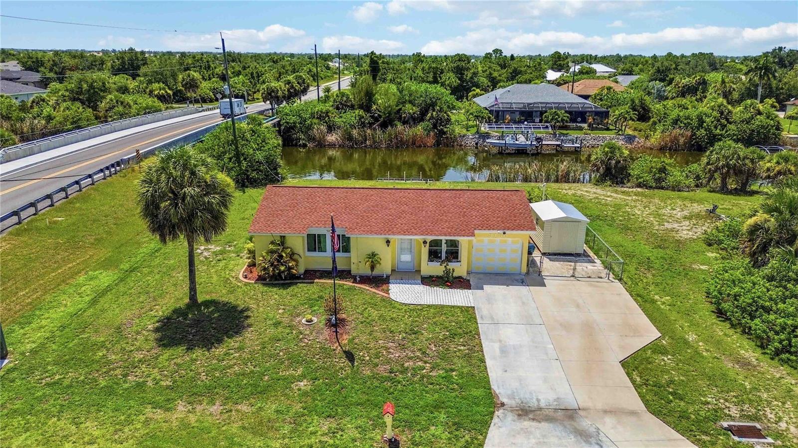 Live the Southwest Florida boating lifestyle you've been dreaming of! This beautifully completely remodeled 3-bedroom, 2-bathroom canal-front home in the highly sought-after South Gulf Cove waterfront community offers an exceptional blend of costal charm, modern updates and outstanding value. 

Designed with peace of mind and effortless living, this move-in ready home features a new roof (2023), impact windows, an updated electrical panel, newer A/C, new water heater, all-new plumbing, freshly painted interior and a portable generator with a designated hook-up. The stunning updated kitchen showcases stainless steel appliances, additional cabinetry, and abundant storage, while the beautifully renovated bathrooms provide a fresh contemporary feel.

Bring all your toys! The expansive parking offers plenty of room for your boat, RV, trailer and multiple vehicles, making it perfect for those who embrace the outdoor lifestyle. Located on a canal with easy access to Charlotte Harbor and the Gulf of Mexico, you'll enjoy world-class boating, fishing, kayaking, island hopping and unforgettable Southwest Florida sunsets.

Surrounded by higher-priced waterfront homes, this property presents an incredible opportunity to own in one of Southwest Florida's premier boating communities while enjoying exceptional value. Spend your days on the water, relaxing on nearby Gulf beaches, golfing, dining at waterfront restaurants, or simply soaking up the year-round Florida sunshine. Step outside to a large patio and expansive yard, perfect for grilling and entertaining, gardening and bird watching, all while enjoying a beautiful canal view. The 90' of sea wall is great for fishing and has plenty of room for a dock and boatlift. 

For added confidence, this home has never flooded. Whether you're searching for a full-time residence, seasonal retreat, or investment property for your portfolio, this waterfront home is ready for you to start living the Florida lifestyle you've always imagined.

Come discover the perfect blend of comfort and convenience at an amazing price-point in this beautifully updated canal waterfront home today.