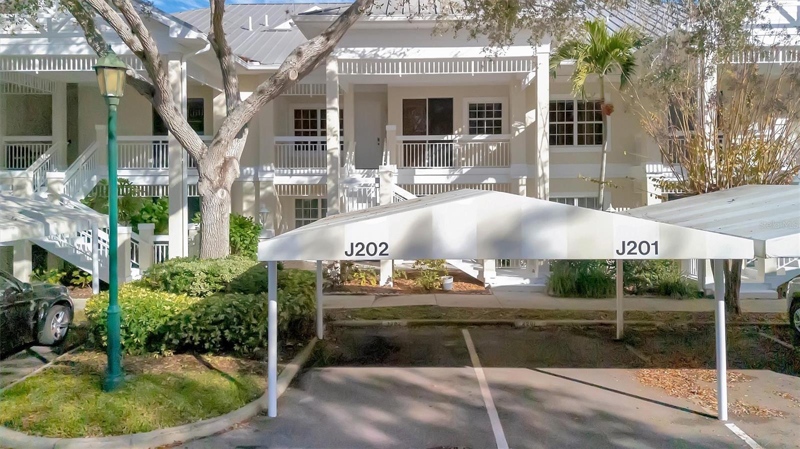Located within the gated Bollettieri Villas at IMG Academy, this spacious villa offers an exceptional opportunity to own one of Bradenton’s most convenient & private locations—just steps from IMG Academy’s East Campus tennis and basketball facilities and minutes from beaches, shopping, dining, and SRQ Airport. Spanning 1,981 square feet, the home features three bedrooms, three full bathrooms, plus a versatile bonus room that can easily function as a 4th bedroom, home office, gym, or study. Cathedral ceilings throughout much of the home create an open, airy feel, while plantation shutters and large windows provide natural light and tranquil preserve views, offering both privacy and a peaceful setting. There is additional flex space off the living room giving owners the opportunity to utilize as a formal dining space or as additional living space. 
The residence has been thoughtfully maintained and partially updated, while also presenting a strong value with opportunity for future cosmetic upgrades, allowing a buyer to personalize the space and build immediate equity. The primary suite sits on its own wing of the property and includes an ensuite bathroom with soaking tub, walk-in shower, and quality finishes. Two bedrooms with shared full bathroom sit on the opposite wing of the home from the master creating additional privacy for all. The kitchen includes extended counterspace overlooking the spacious living room, a breakfast nook, and a dedicated walk-in pantry. The property includes its own laundry room in unit with a sink cabinet. There is an additional storage closet just off the outdoor front porch.  The HVAC system is equipped with humidistat and ultraviolet purification to support air quality. 
A private, gated front balcony provides a quiet outdoor retreat, ideal for morning coffee or relaxing evenings. A brand-new canvas awning with a metal frame will add the rare benefit of three covered parking spaces, a standout feature within the community.
Residents enjoy access to a heated community pool, spa, and fitness room, along with walkable proximity and golf-cart access throughout IMG Academy. The community allows one-month minimum rentals, making this property well-suited for long-term rental investment, seasonal use, or owner occupancy—a flexible option in a high-demand area driven by IMG Academy and nearby amenities.
Just a short drive to grocery stores, UTC Mall, downtown Sarasota, and the Gulf beaches, this villa offers an ideal blend of location, space, investment potential, and long-term value. (One or more of these photo(s) have been virtually staged)