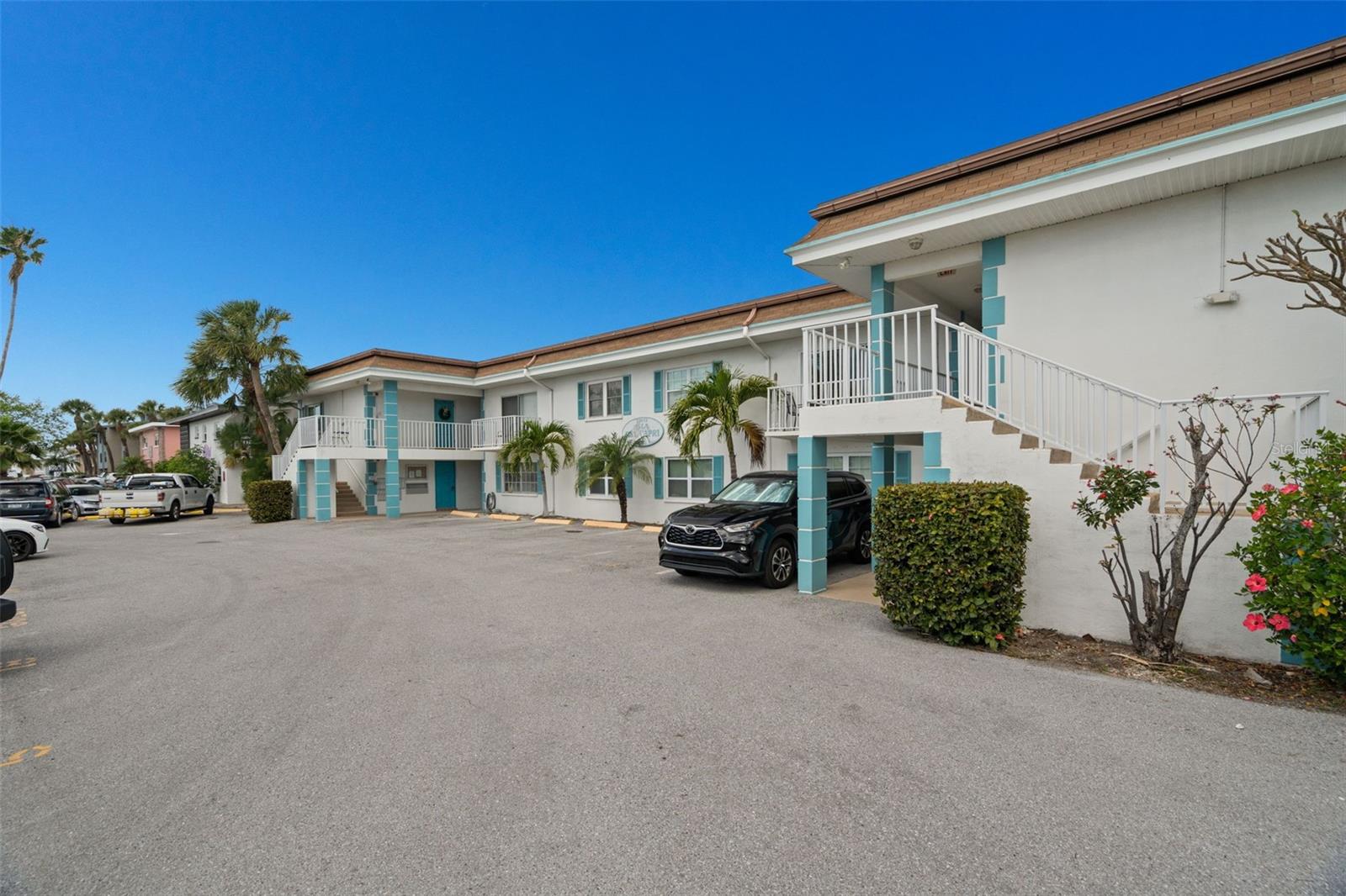 Discover the perfect blend of beachside charm and waterfront living in this beautifully reimagined Treasure Island retreat. Ideally located just a short distance to the beach and just a short bike ride to the renowned John’s Pass Village, this fully renovated 1-bedroom, 1-bath condo offers an exceptional coastal lifestyle. Designed with a modern coastal aesthetic that brings the beach indoors, the home features a bright, open floor plan that lives larger than expected, along with a spacious bedroom retreat for added comfort. Recent updates include Shaker-style cabinets, Granite Counter, Newer Appliances, Newer A/C (2018) and Water Heater (2022), providing peace of mind alongside stylish finishes. Situated in the desirable Isla Del Capri community, this ground-floor unit offers ultimate convenience with no stairs and no age restrictions. The intimate community of just 18 units ensures privacy while delivering a relaxed, low-maintenance lifestyle. Step outside to enjoy tranquil waterfront views, unwind by the community pool, or fish from the shared dock—all just steps from your back door. Whether sipping your morning coffee or enjoying an evening glass of wine by the water, you’ll appreciate having beaches, boating, dining, and vibrant island living right at your fingertips. Additional conveniences include on-site laundry and a comprehensive HOA that covers basic cable, internet, water, sewer, trash, escrow reserves, pool maintenance, insurance, and pest control—making this property ideal as a primary residence, vacation getaway, or investment opportunity.