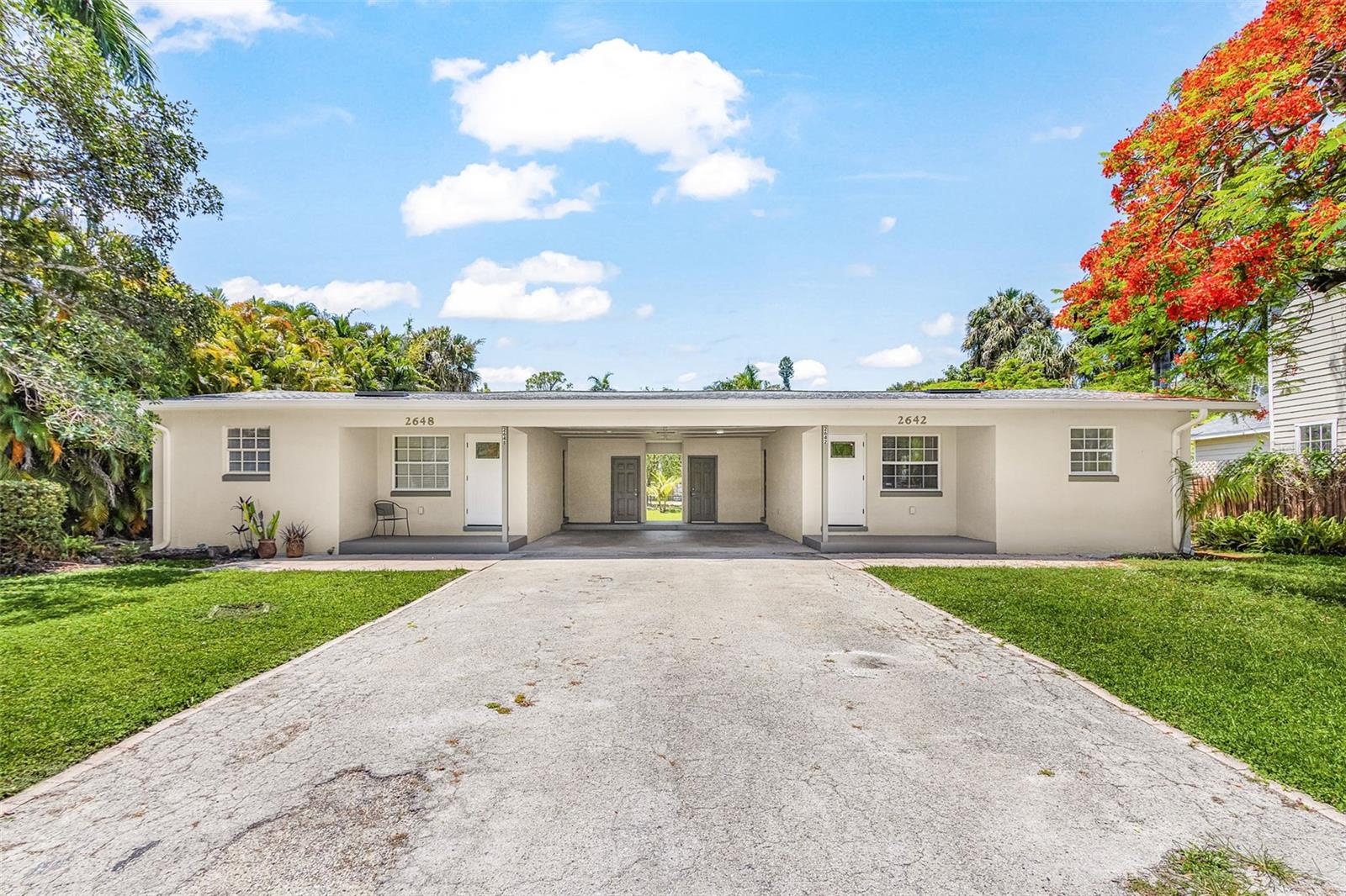 Completely Renovated Duplex in the Historic Fort Myers District — Close to Downtown Fort Myers! This rare income-producing property has been rebuilt from top to bottom and is essentially a brand-new duplex. Each spacious unit offers 2 bedrooms, 1 bathroom, and a bright, modern interior featuring all-new cabinets, countertops, appliances, laminate flooring, electrical, plumbing, and air conditioning systems. A brand-new roof adds even more peace of mind. The thoughtfully designed layout includes a central carport separating the two units, with each side having its own private laundry room. Situated on an oversized 1/3-acre lot, the property offers plenty of parking and outdoor space — a rare find this close to downtown. All renovations and upgrades have been fully permitted, providing confidence and long-term value for buyers. Located in the highly desirable historic area of Fort Myers, this turnkey property is just a short walk to the vibrant Downtown River District with its restaurants, shopping, entertainment, and nightlife. Perfect for investors seeking strong rental potential or owner-occupants looking to offset expenses with rental income, this is a unique opportunity to own a completely updated duplex in one of Fort Myers’ most charming and convenient neighborhoods.