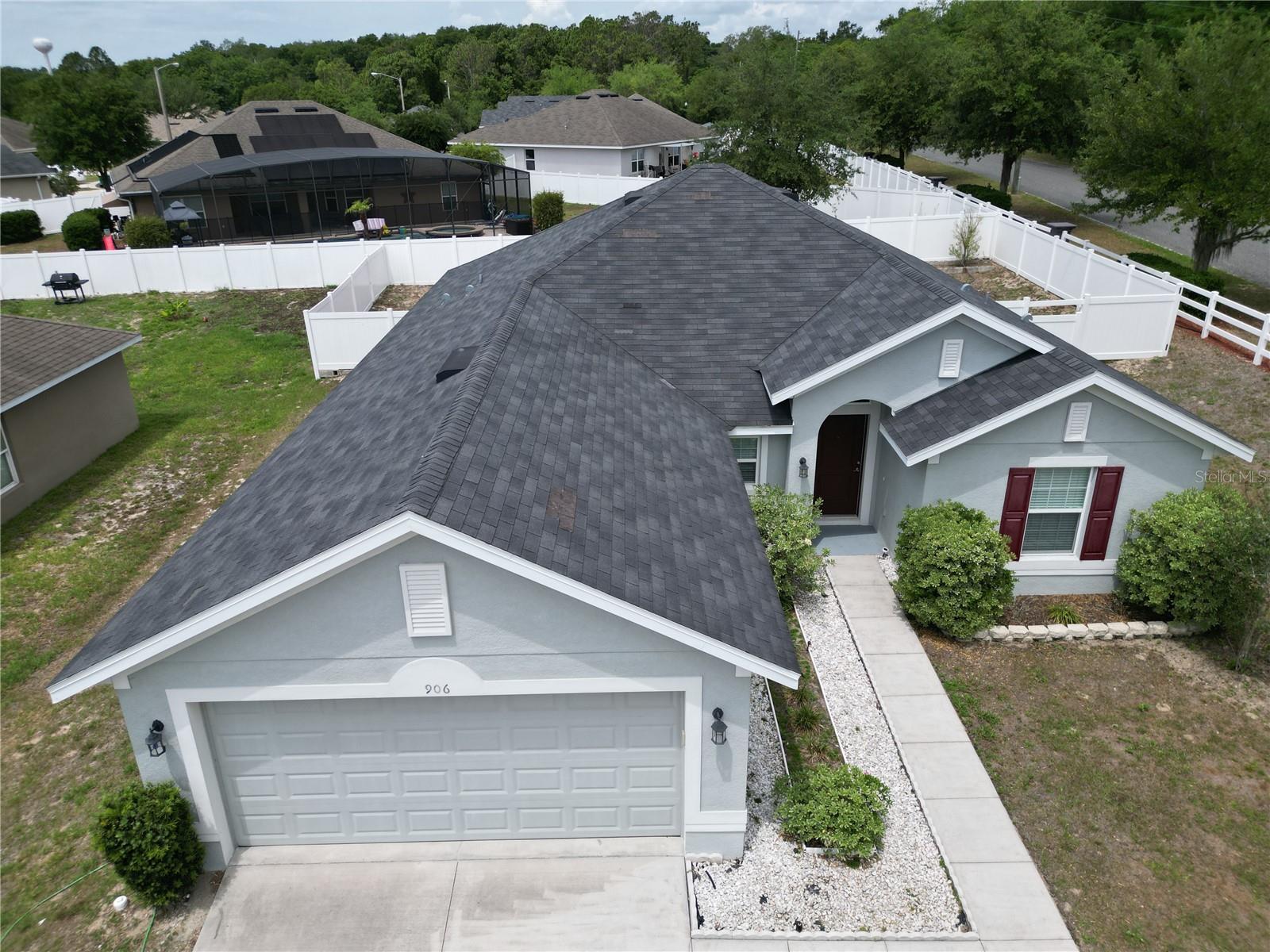 Welcome to this beautifully maintained 4-bedroom, 2-bath home located on a desirable corner lot in the peaceful yet convenient community of Chelsea's Run. Built in 2018, this spacious block home offers modern comfort, thoughtful design, and the perfect setting to create lasting memories.
Ideally situated just minutes from US Hwy 27/441, you’ll enjoy easy access to shopping, dining, entertainment, and everyday conveniences while still coming home to a quiet neighborhood atmosphere.

Step inside to an inviting entryway featuring vaulted ceilings and an open-concept floor plan designed for both comfortable family living and effortless entertaining. The kitchen is the heart of the home, complete with a center island perfect for meal prep, casual dining, or serving guests.

The split-bedroom layout provides added privacy, with a spacious primary suite featuring a large walk-in closet and an ensuite bath with dual vanities, a relaxing garden tub, separate shower, and private water closet. A versatile front bedroom with a generous closet offers endless possibilities as a home office, den, or guest space. Two additional bedrooms and a full guest bath are located on the opposite side of the home, along with a conveniently sized laundry room.

Enjoy Florida living year-round from the covered back patio — the perfect spot for morning coffee or unwinding in the evening. With a 2018 roof, HVAC, and water heater, this home offers peace of mind along with style and functionality.

Don’t miss your opportunity to make this exceptional home your own and start enjoying the Florida lifestyle today!