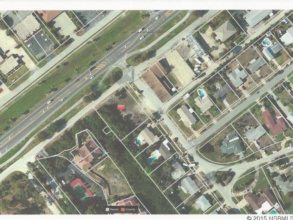 Vacant lot on the North Causeway. Zoning allows business/commercial.; Cleared: Partial ;Water: Available at Site