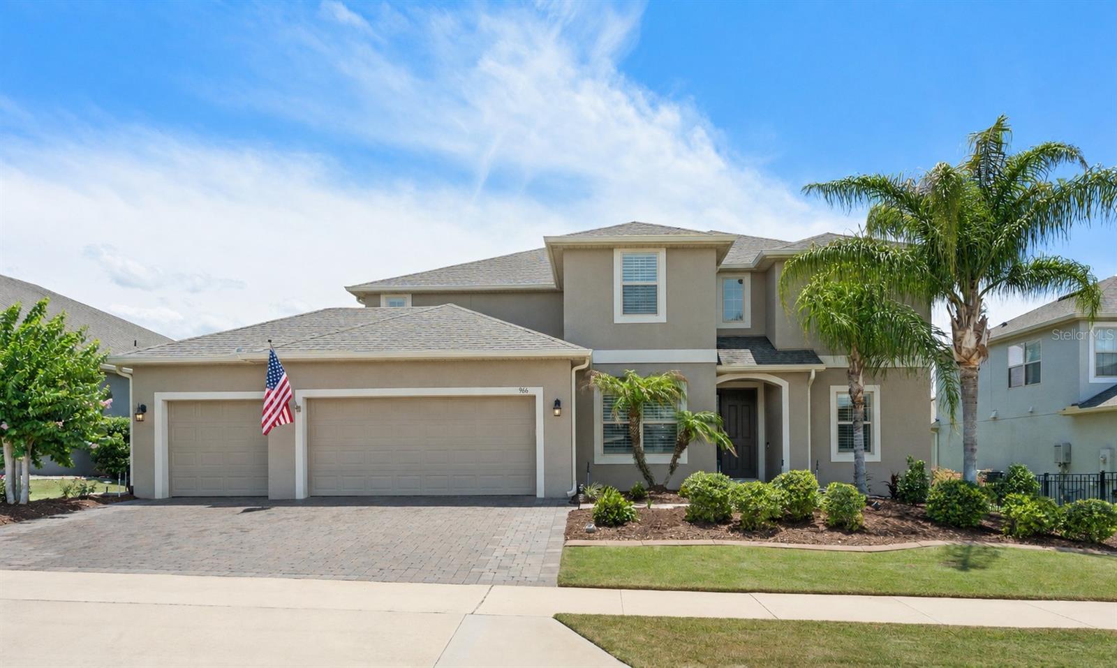 Welcome home to this impeccably maintained Highland Ranch pool home offering 4 bedrooms, 4.5 bathrooms, a private office, game room, theatre room, air-conditioned 3-car garage, and a saltwater pool with heated spa. The thoughtfully designed Harwood floor plan features a first-floor primary suite, multiple gathering spaces, and a private upstairs bedroom with an ensuite bath, providing flexibility for multi-generational living. Throughout the home, architectural details and thoughtful design elements create a timeless feel that is both elegant and welcoming. From the high ceilings to the well-planned living spaces, every room offers something to appreciate. It is the kind of home that simply cannot be fully captured in photographs and is best experienced in person. The main level features a private office, formal dining room, and a spacious great room with soaring ceilings that enhance the home's open feel. The kitchen offers an open and functional layout with a large center island, granite countertops, gas stove, coffee bar, breakfast bar, breakfast nook, oversized walk-in pantry, and abundant storage. The first-floor primary suite serves as a private retreat with dual vanities, an oversized walk-in shower, and a generous walk-in closet. A convenient half bath is located just off the great room, while the full cabana bath provides direct access to the pool area, making it ideal for entertaining. Upstairs, you'll find a game room, theatre room, and a private bedroom with a walk-in closet and full ensuite bath, ideal for guests, or use as a second primary suite. Completing the upper level are two additional bedrooms and a full bathroom in a two-way split layout. Step outside and enjoy your own backyard retreat featuring a screened lanai, paver pool deck, saltwater solar heated pool with gas heated spa, sun shelves, cabana bath with full shower, and outdoor TV hookups. Whether hosting gatherings, spending time with family, or relaxing poolside, this outdoor living space is designed to be enjoyed year-round. Additional features include an instant gas water heater, paid-off solar for pool heating, air-conditioned garage and direct access to the West Orange and South Lake Trail systems, providing more than 26 miles of connected walking, running, and biking trails right from the community. Highland Ranch residents enjoy resort-style amenities including a community pool, splash pad, basketball and volleyball courts, dog park, and fire pit. Conveniently located near shopping, dining, top-rated schools, and major roadways, this home combines space, flexibility, and lifestyle in one of Clermont's most sought-after communities.