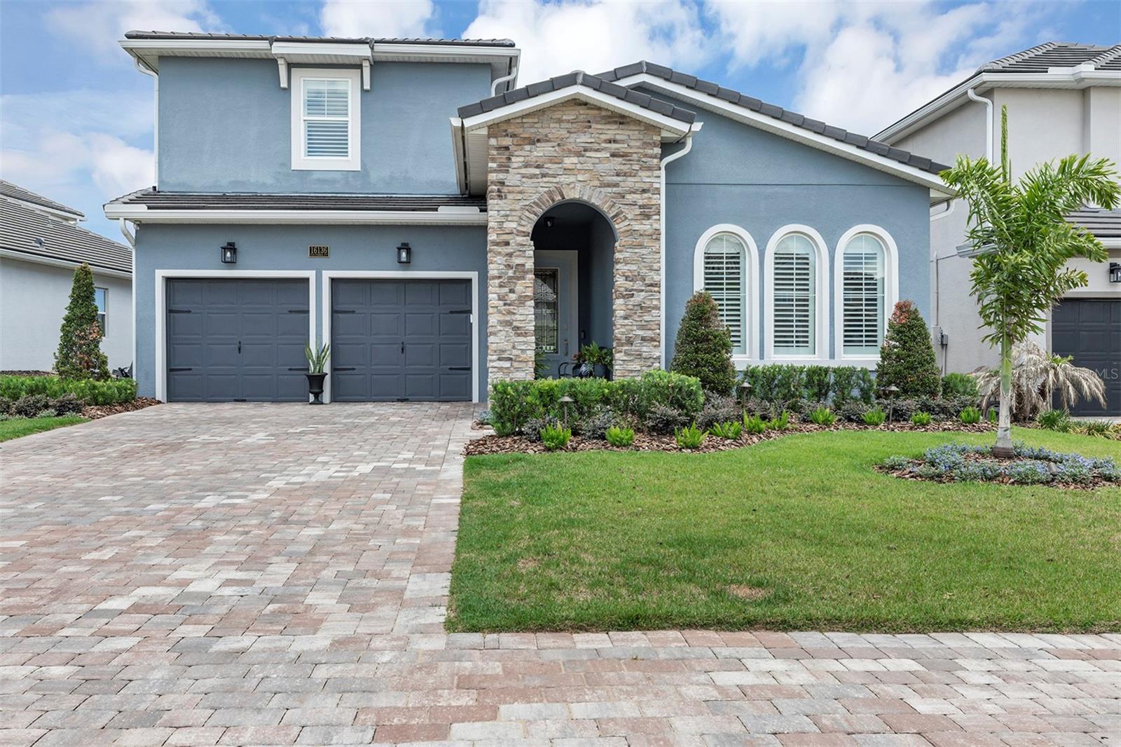 Live life's dream surrounded by timeless beauty in Central Florida's exquisite private golf community of Bella Collina.  Dream Finders Homes' Anna Maria with bonus and balcony model offers 5 bedrooms, 3 1/2 baths with primary suite downstairs.  Gourmet kitchen has beautiful KitchenAid appliances including a gas cooktop.  Huge island with quartz countertops is perfect for entertaining.  Beautifully organized walk-in pantry and coffee bar complete the kitchen.  Downstairs family room has sliders that pocket to open out to covered lanai with summer kitchen and gorgeous salt water pool and spa.  There are 3 additional bedrooms downstairs.  Upstairs is a spacious bonus room with access to an upstairs porch overlooking the golf course.  The en-suite bedroom upstairs has a walk-in closet and makes a great space for guests or adult children.  The 24 hour guarded community features a signature Nick Faldo golf course, private 350 acre spring fed lake, 75,000 sq ft clubhouse, 6 lighted tennis courts, fitness facility, expansive club pool with lap lanes and poolside service, full service spa, banquet facility and multiple dining options.  Social membership is required at a cost of $40,000.