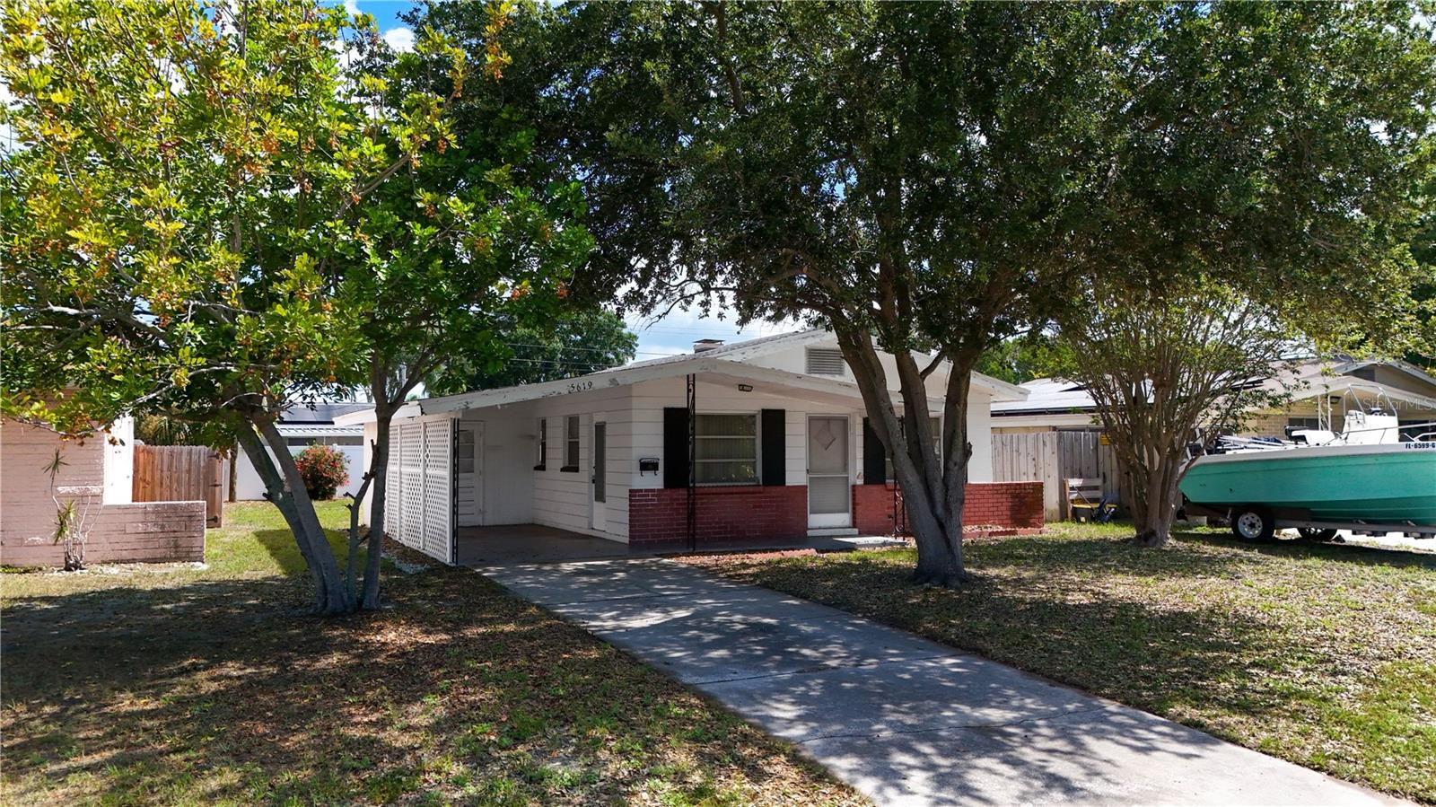 Opportunity is knocking with this charming 2-bedroom, 1-bath home in a desirable St. Petersburg location, offering plenty of potential to make it your own. With a functional layout, a covered 1-car carport, and a spacious backyard perfect for entertaining, gardening, or future outdoor additions, this property is an excellent option for homeowners and investors alike. While a few cosmetic updates will bring out its full potential, the home is situated in a non-flood zone for added peace of mind. Conveniently located just minutes from Tyrone Square Mall, Walter Fuller Park, Northwest Park, vibrant Downtown St. Petersburg, and the award-winning Gulf beaches, you'll also enjoy easy access to shopping, dining, entertainment, and everyday conveniences. Don't miss this fantastic opportunity to create the home you've been dreaming of, schedule your private showing today!
