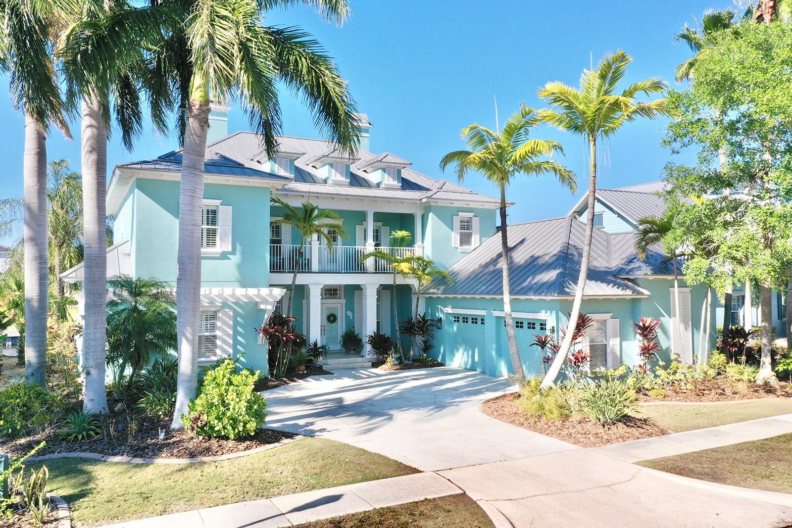 Experience elevated waterfront living at 615 Islebay Drive, a beautifully renovated pool home positioned on one of MiraBay’s larger homesites on a main canal with direct, quick access to Tampa Bay and no boat size restrictions.Designed for both relaxed coastal living and exceptional entertaining, this 5-bedroom, 3.5-bath residence offers expansive indoor-outdoor spaces, stunning water views, and unforgettable sunsets surrounded by the natural beauty of Florida’s Gulf Coast - including frequent dolphin and daily manatee sightings right from your backyard.The outdoor living experience is truly exceptional, featuring a private saltwater pool, expansive travertine terraces, dual balconies, built-in grilling station, dual granite-topped bars, and multiple gathering spaces designed for waterfront entertaining.Inside, extensive recent renovations create a fresh, refined coastal aesthetic throughout the home. The redesigned chef’s kitchen features quartz countertops, designer finishes, upgraded cabinetry, new appliances, and seamless flow into the main living areas. Wide-plank oak flooring extends throughout much of the home, complementing the bright, open layout and updated coastal design.The first-floor primary suite offers a private retreat with a spa-inspired bath and dual closets. Upstairs, a spacious loft with wet bar and balcony access provides the ideal setting for entertaining, movie nights, gaming, or additional living space. Five true bedrooms means space for a dedicated home office, fitness room, and guest suite - without sacrificing a single bedroom. Thoughtfully improved and meticulously maintained, the home also features a metal roof, hurricane-impact windows, recent exterior paint, refreshed landscaping with river rock, and numerous upgrades that occurred during an off-market break (2024/25) that enhance both style and peace of mind - creating a truly move-in-ready waterfront retreat.With exceptionally low carrying costs - low flood insurance/HOA/utilities - this home offers rare affordability for waterfront living of this caliber.Beyond the home, MiraBay offers a true resort-style waterfront lifestyle with a clubhouse, café, fitness center, pools, tennis and pickleball courts, scenic trails, and vibrant year-round community events.