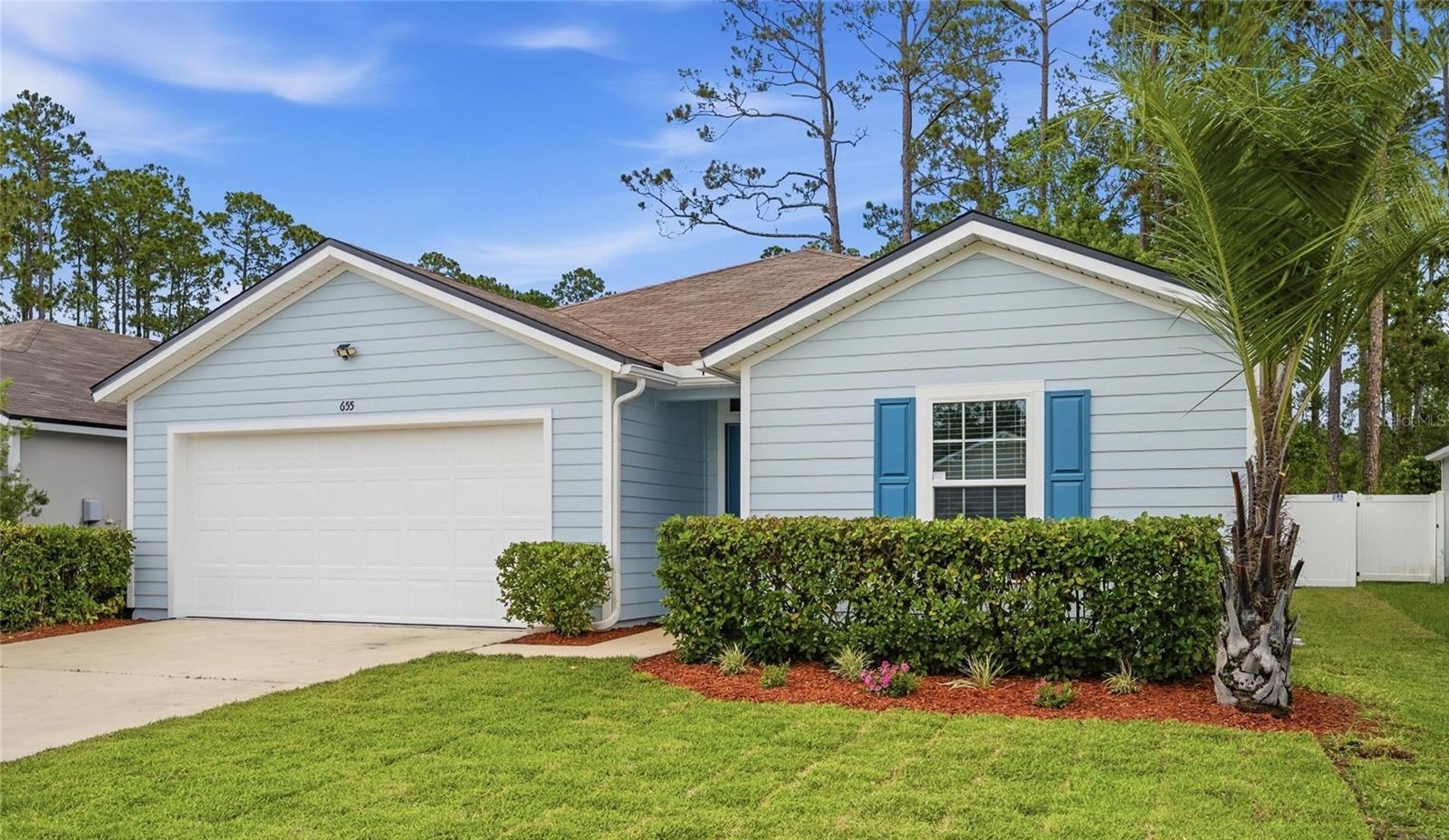 $10,000 PRICE REDUCTION – BEST VALUE IN THE COMMUNITY! Completely renovated and move-in ready, this beautiful 4-bedroom, 2-bath home offers exceptional value in a sought-after golf course community with resort-style amenities. With 2,243 total SF (1,698 SF under air), this open-concept floor plan features a spacious kitchen overlooking the dining area and great room, perfect for entertaining and everyday living.

Recent upgrades include luxury vinyl plank flooring throughout, fresh interior and exterior paint, updated lighting fixtures, and new ceiling fans with lights in all bedrooms. The bright white kitchen offers abundant cabinetry, a large center island, gas range, new refrigerator, and ample storage throughout the home.

Additional features include a tankless water heater, irrigation system with reclaimed water, and numerous storage closets. The backyard has been enhanced with new white vinyl fencing, providing privacy and security, along with new sod and landscaping and an extended professionally coated patio ideal for grilling and outdoor gatherings. The freshly painted two-car garage also features professionally coated flooring.

Enjoy living in a desirable golf course community offering a clubhouse, fitness center, resort-style pool, tennis courts, walking and biking trails, and more. Conveniently located near shopping, dining, Flagler Beach, and historic St. Augustine.

The seller has just reduced the price by $10,000, creating one of the best opportunities currently available in the community. Compare the updates, condition, and price—this home stands out as one of the best values currently available in the community. Extensive renovations have already been completed—just move in and enjoy!