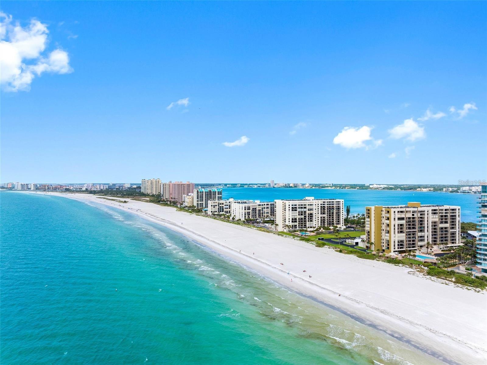 LOCATION LOCATION LOCATION! Welcome to SOUTH BEACH! Located in SAND KEY, which is located in the QUIET And DESIRABLE Part of Clearwater Beach! Away from all the tourists and busyness! Enjoy the Quietness and Endless Views & Sunsets right from your Balcony and Unit. This Location and Complex offers Peace and Serenity and Just Pure Relaxation! 
This is a GATED and PET FRIENDLY Community with NO Age Restrictions. 
This Unit sits on the 7th Floor with Views of BOTH, The BEACH and Intercostal Waters & Pool View! This unit Features Tile Throughout the Unit and 2 Spacious Bedrooms, Both with Balcony and WATER VIEWS. This unit Features 2 Balconies. The Master Bedroom is Very Spacious with his & her closets, A Large Balcony and Remote Controlled Blinds! This unit also Features INDOOR LAUNDRY, a Newer Updated Kitchen(2022), Newer Hurricane Impact Sliding Doors(2021), Newer Washer & Dryer(2023), a Newer Water Heater(2022) a Newer AC(2018) and Newer Remote Controlled Blinds(2019).
This unit comes with a COVERED Carport and a Private Storage unit. 
Additional perks include abundant guest parking. The LOW HOA fee covers Cable, Internet, water, sewer, trash, security, exterior maintenance, grounds, insurance, and escrow reserves, ensuring a worry-free living experience. The community Amenities elevate the experience with a Beachfront Pool, Tiki tables along the sandy shore, a Fitness center, and a club room for gatherings. This community is meticulously maintained and offers the ultimate coastal lifestyle with Shopping, Restaurants and Bars all within WALKING distance! PICKLEBALL and Tennis COURTS right Across the street!! Downtown St. Petersburg is only 30 minutes away, and Tampa is just a 40-minute drive. Plus, you have two great Airports to choose from—the highly acclaimed Tampa International Airport is just 30 minutes away, and Clearwater St. Pete International Airport is a convenient 15-20 minute drive. Buy the Beach House and come Start Enjoying the Beach Life today! Don’t miss your chance to own this stunning Beachfront Retreat—schedule your private showing today!