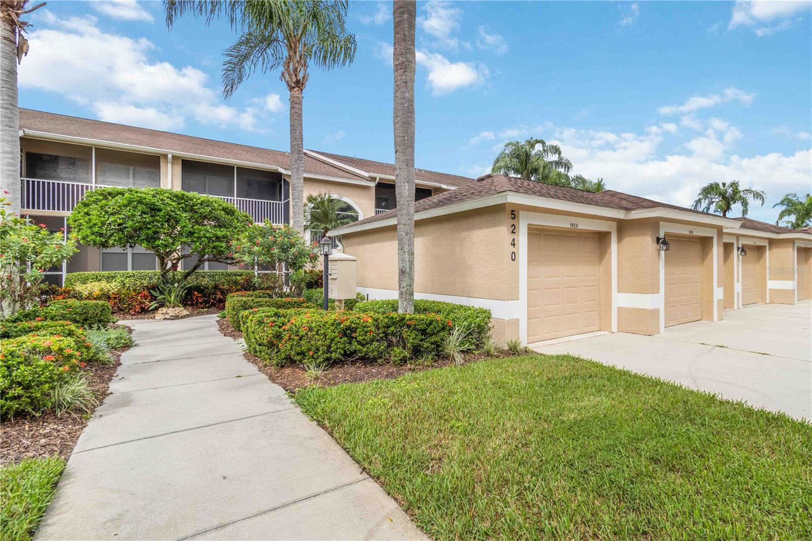 Stunning golf course and lake views await you in this beautifully renovated ground floor, fully furnished 2BR + den, 2BA condo in the highly desirable Heritage Oaks Golf & Country Club. Overlooking the signature 14th hole and a peaceful lake, this move-in ready home features a remodeled kitchen with granite countertops, modern appliances, and a classic open floor-plan. Both bathrooms have been tastefully updated with granite vanities and frameless glass walk-in showers. A brand-new AC unit ensures year-round comfort, and the private one-car garage adds convenience and storage. Offered fully furnished, this unit is perfect as a seasonal retreat or full-time residence. Heritage Oaks offers a Ron Garl–designed 18-hole championship golf course, 5 heated pools, 4 tennis courts, fitness center, scenic walking trails, and a 20,000 sq. ft. clubhouse with a full-service restaurant. Don't miss your chance to own one of the best views in this amenity-rich, gated Sarasota community.