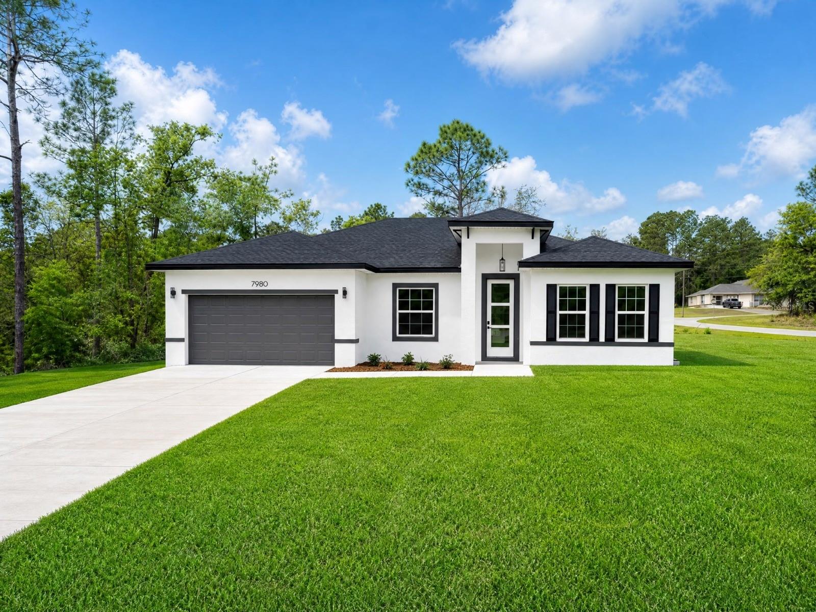 Brand-New Corner Lot Home in Desirable Dunnellon

Welcome to this stunning new construction home situated on a spacious corner lot in a desirable Dunnellon location. Thoughtfully designed with comfort, style, and functionality in mind, this beautiful residence offers 4 bedrooms, 2 full bathrooms, and an open-concept floor plan perfect for modern living.

The spacious living and dining areas create an inviting atmosphere for both everyday living and entertaining. The well-appointed kitchen serves as the heart of the home, featuring solid wood cabinetry, elegant stone countertops, and a full set of included appliances, providing both beauty and convenience from day one.

The private primary suite offers a relaxing retreat with a generous walk-in closet and an en-suite bathroom. The additional three bedrooms are well-sized and equipped with built-in closets, providing ample storage and flexibility for family members, guests, or a home office.

Adding to the home's appeal is the attached 2-car garage, offering plenty of space for vehicles, storage, and everyday convenience. The corner lot location enhances curb appeal while providing additional yard space and greater privacy.

Ideally located near a major roadway, this home offers easy access to shopping, dining, and daily amenities. Families will appreciate the proximity to highly rated schools, making this property an excellent choice for homeowners seeking both convenience and long-term value.

This move-in-ready new construction home combines quality finishes, a functional layout, and a prime Dunnellon location. Don’t miss the opportunity to make this exceptional property your new home.