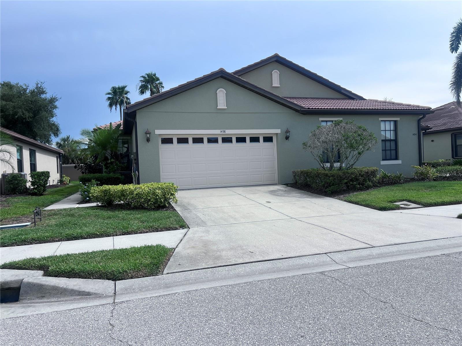 Wow! Venetian Falls! What an in demand over 55 community this is! All the activities and amenities you could imagine in this well maintained gated community! This paired villa, zero lot line home features are a large primary suite with spacious bathroom and a HUGE walk-in closet! second bath has great lighting. Den is great for an office, quiet getaway or extra sleeping area. Large laundry room has beautiful wood cabinetry and built in laundry sink. Nice garage. NEW AIR CONDITIONER! Thinking a great place to live in Venice year-round or as a winter home, then look no more! Venetian falls has a sprawling clubhouse and entertainment area that features heated lap pool and spa, unique resistance walking pool, exercise and fitness area, billiard room and more! A full time activities director and on site management office make for ease of a fun lifestyle! Irrigation, lawn care, roof pressure washing, exterior paint, cable tv and internet are all included in the modest monthly fee. NO CDD Lots of close by shopping, restaurants and the beach!! enjoy Historic downtown Venice and the New Downtown Wellen Park and the Cool Today Baseball stadium within minutes!