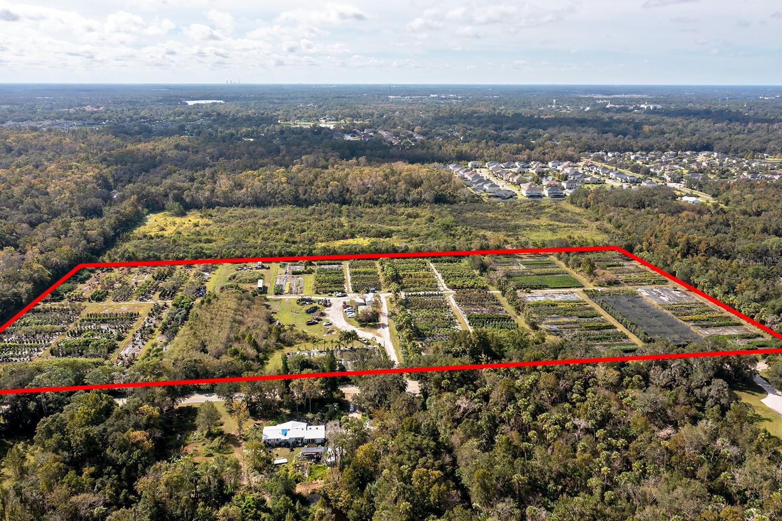 Opportunity awaits! While this property has been loved as a nursery, these parcels, totaling ±20.89-acres, are ready to be reimagined. Two adjacent lots are being sold with these parcels, increasing the total acreage to ±42.89 acres. All parcels are zoned A-5, with an R-1 zoned neighborhood along part of the southern border. This property is part of Transition Area Number 1, within the City of Oviedo and Seminole County Joint Planning Area, also known as the Future Oviedo Annexation Area. To the south, the community, Retreat at Lake Charm, borders this group of parcels and features an R-1 zoning while residing within the City of Oviedo. This helps the subject property to meet one of the primary planning elements when considered for annexation into the City of Oviedo, and potential for increased density. Oviedo has shown exceptional growth, named "Best Suburb to Raise a Family in the Orlando Area" and “50 Best Places to Live in America” by major publications. This city, of approximately 40,000 residents, has a median age of 36 and household incomes that are some of the highest in Central Florida. The area also boasts an exceptional educational system with A-Rated schools in addition to numerous recreational amenities just steps away. Listing agent will accompany all showings. Please do not approach the property without an appointment. Feel free to drive around the area at any time.