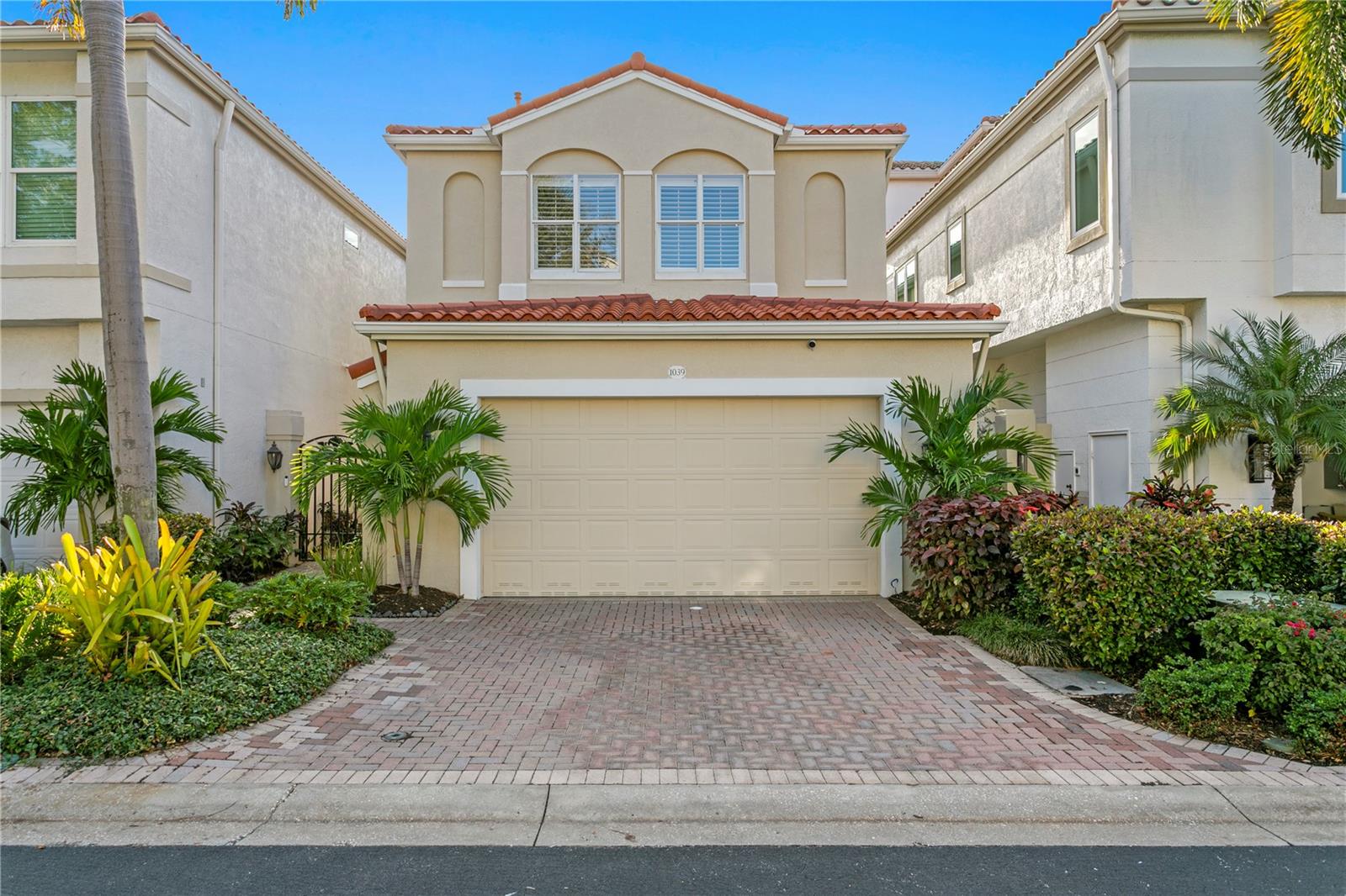 Experience waterfront lifestyle and refined comfort on prestigious Harbour Island, a
gated island community just steps from Tampa’s Riverwalk and the energy of Water
Street. Designed for effortless entertaining, the home welcomes you with double doors
and a dramatic staircase leading to an open concept living level. Sun-filled rooms flow
to oversized impact-rated sliding doors that dissolve the line between indoors and out —
revealing a sparkling pool, covered entertaining terrace, and private boat dock with lift.
The expanded chef’s kitchen is a showpiece: classic light cabinetry, a generous wood-
tone island, Wolf induction cooktop and ovens, Sub-Zero refrigeration, Asko
dishwasher, a finished walk-in pantry, and two side-by-side Sub-Zero wine refrigerators.
Thoughtful storage solutions abound throughout the home. A downstairs office or
optional fourth bedroom with adjacent bath and an oversized utility room add everyday
convenience.
Upstairs, rich wood floors lead to a primary suite that spans the water side, complete
with sitting area, private balcony, custom closet systems, and an updated spa bath. Two
additional bedrooms share a tastefully renovated bath, and a generous linen/storage
closet completes the level. Modern systems include a 2019 roof, tankless water heater
with filtration and softener, and an organized two-car garage. Live where the city meets
the water — parks, dining, arts, and effortless access to major routes and Tampa
International Airport make this Harbour Island residence a rare Tampa find.