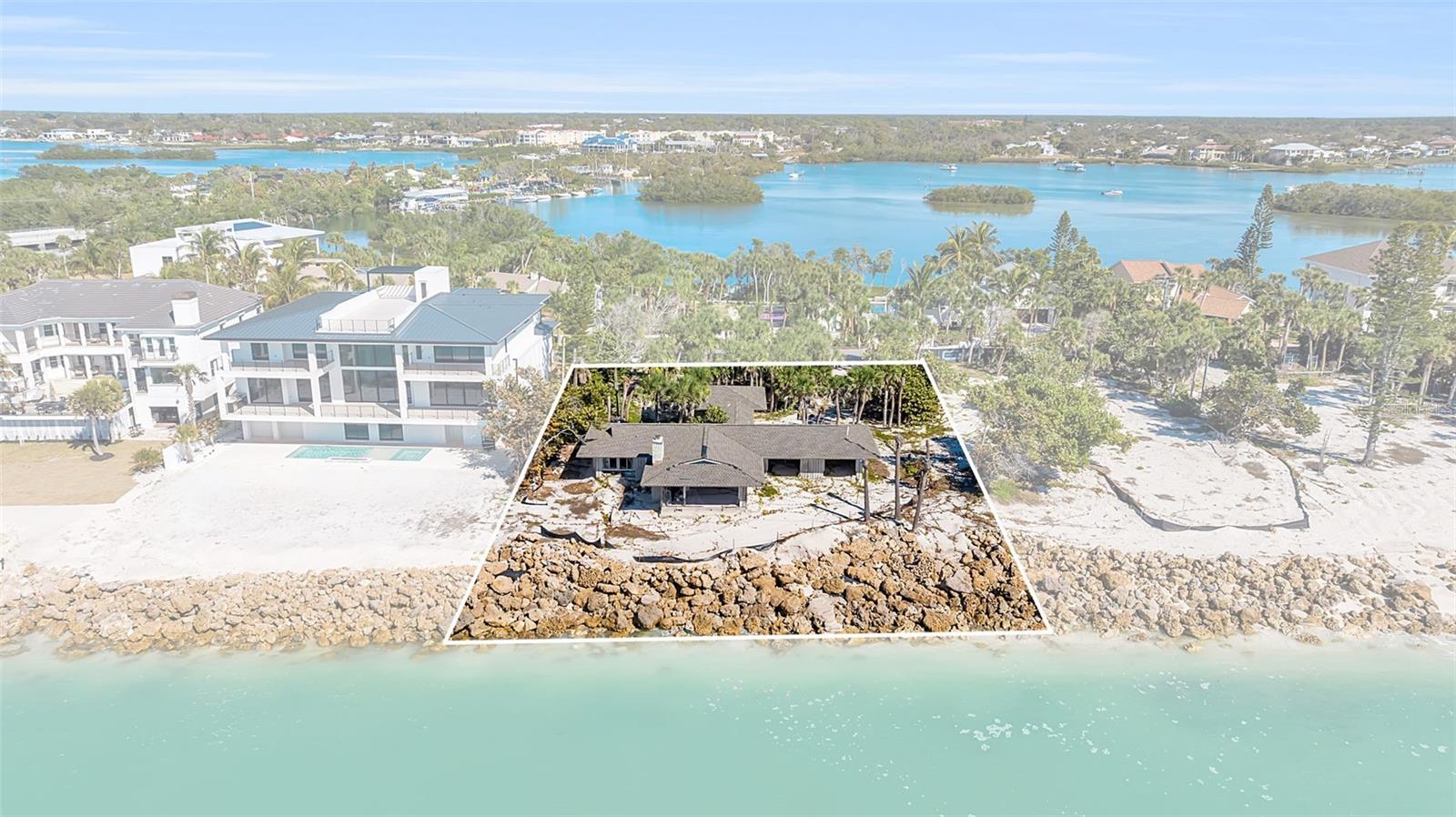 Under contract-accepting backup offers. Set along one of the most coveted stretches of Casey Key, 4001 Casey Key Road presents a rare opportunity to secure nearly half an acre of direct Gulf-front property in Nokomis. Boasting approximately 99 feet of frontage on the Gulf of Mexico and spanning roughly 0.47 acres (20,381 square feet), this expansive homesite offers unobstructed water views, direct beach access, and everyday sunsets over the Gulf.  Casey Key is treasured for its quiet, residential character, free from high-rise development, while still offering convenient access to the mainland. Just minutes away are the shops and dining of Venice Island, waterfront restaurants in Nokomis, and easy connectivity via U.S. 41 and I-75. Sarasota’s cultural amenities, golf courses, marinas, and private aviation options are all within a short drive, making this an exceptional blend of seclusion and accessibility. Create your dream Gulf-front estate, with full Gulf views, direct water access, and a premier address on one of Southwest Florida’s most prestigious barrier islands, 4001 Casey Key Road is ready for its next chapter.