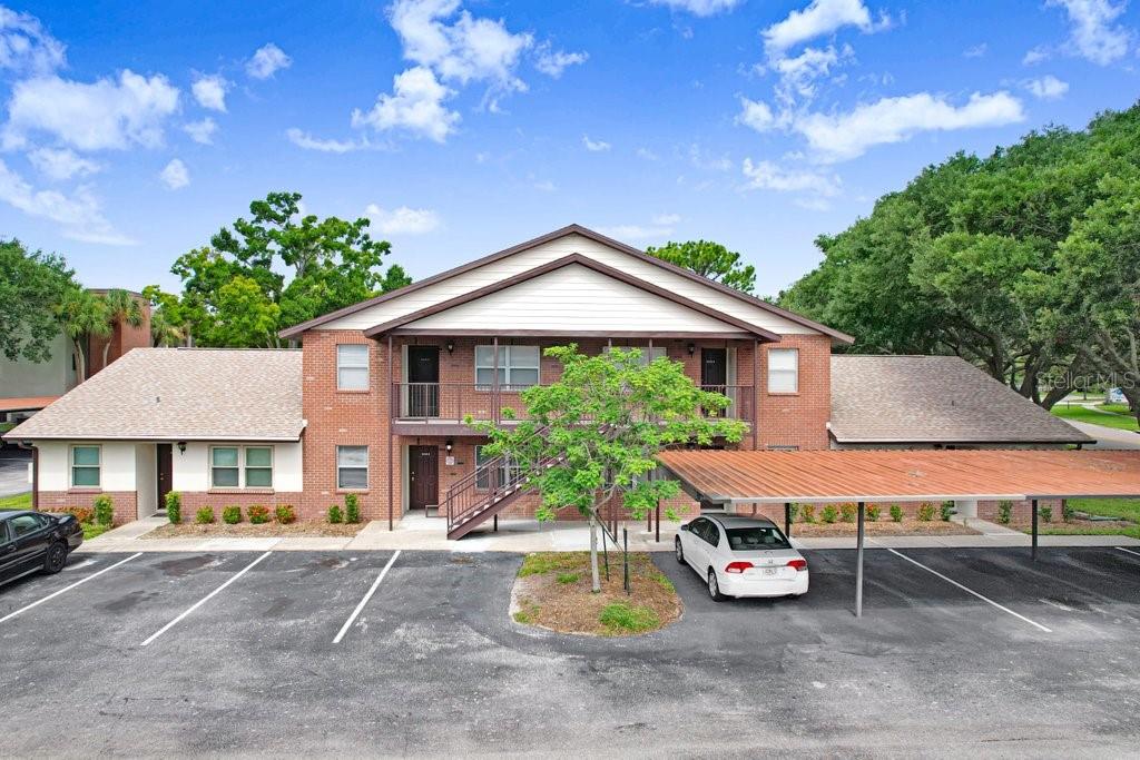 Welcome to one of the best values in Clearwater's Countryside area! A 2-bedroom, 2-bath condo with monthly maintenance fees among the lowest you'll find at this price point.

Inside, the 915 sq ft layout lives larger than the number suggests: a bright, open great room, indoor laundry, and a well-appointed kitchen with granite countertops, soft-close drawers, a pantry, and newer appliances. Ceiling fans throughout keep things comfortable and the power bill in check, and the oversized screened patio is ready for morning coffee or an evening glass of wine.

The pet-friendly community offers a pool, and the unit comes with its own covered carport space plus plenty of guest parking. Best of all, it sits in flood zone X — high and dry. You're minutes from Countryside Mall, shopping, and dining, with an easy drive to Clearwater Beach.

Low fees move-in-ready home in the heart of Clearwater, this one checks all the boxes. Schedule your showing today.