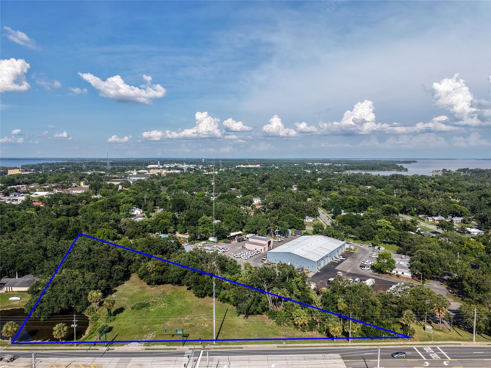 Offered is an acre and a half of land, located directly on HWY 27 with 440' of frontage at the signalized intersection of Yellow Jacket Way.   This land is zoned C3, with a future land use of Institutional.   Located directly across from Leesburg high school, this is an ideal location for any business.  2 curb cuts currently exist and the land is cleared and ready for development.  Inquire with your agent today.