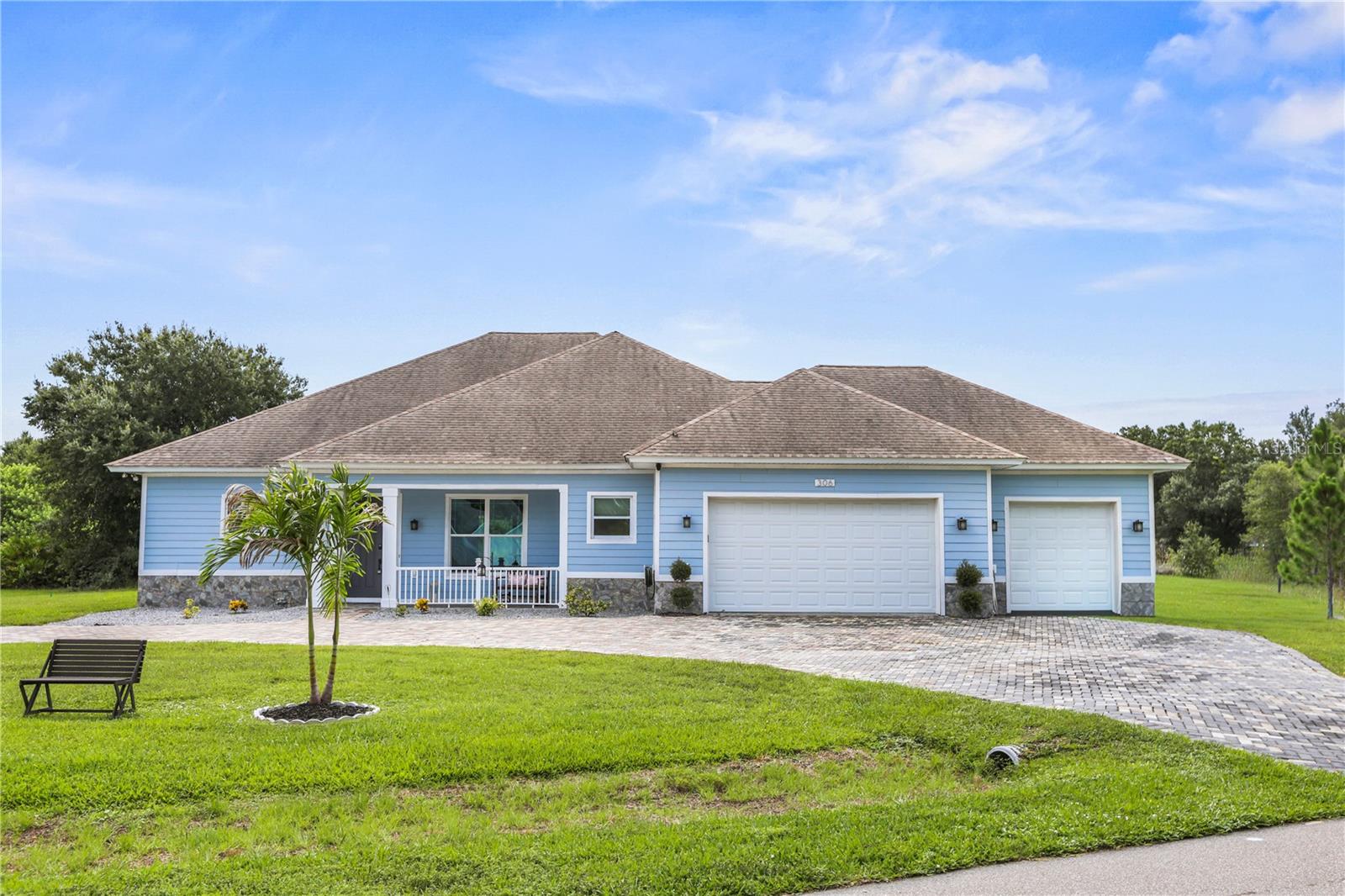 What if your next chapter included more sunshine, lower utility bills, and room to truly enjoy life? Welcome to **306 Calendar Street** in Port Charlotte—a home designed for those ready to trade harsh winters for the Florida lifestyle they've always imagined.

Built in 2019, this 2,432-square-foot home offers 4 bedrooms, 3 bathrooms, and a spacious 3-car garage, all situated on over half an acre. With plenty of room to spread out, entertain, or simply enjoy your own private outdoor space, this property delivers the freedom that's becoming increasingly difficult to find.

Constructed with **Insulated Concrete Form (ICF) construction**, **hurricane-impact windows**, and **solar panels**, this home was built with durability, efficiency, and peace of mind in mind. The ICF construction provides exceptional strength and insulation, while the impact-rated windows provide added protection during storm season and help reduce outside noise. The solar energy system helps keep monthly utility costs low, making everyday living more economical year-round.

Inside, the open-concept layout creates a bright and welcoming atmosphere that's perfect for family gatherings or hosting friends who come to visit. Step outside to discover endless possibilities—from creating your dream backyard retreat to enjoying a little homesteading. The existing chicken coop is ready for buyers who would love fresh eggs each morning, or it can easily be repurposed or removed to fit your vision.

Conveniently located near shopping, restaurants, golf, boating, waterfront parks, and the Gulf Coast's world-famous beaches, this home offers the perfect balance of privacy and accessibility. With nearby airports providing easy travel back to visit family and friends, relocating to Southwest Florida has never been more convenient.

Whether you're leaving behind snow, high taxes, or simply looking for a better quality of life, 306 Calendar Street offers more than just a beautiful home—it offers the opportunity to embrace everything that makes Florida living so rewarding. Schedule your private showing today!