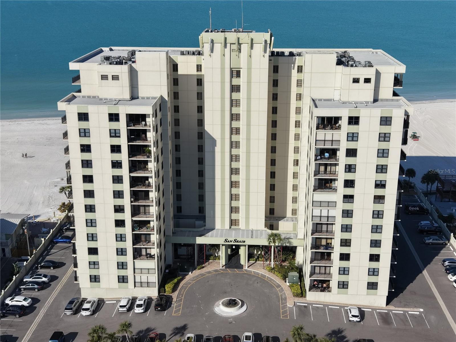 Premier St Pete Beach location at the SanSeair Complex. DIRECT BEACH FRONT LIVING with Hallmark Sunsets over the Gulf — a MUST SEE! Enjoy panoramic views of the Beach in this Luxury Corner Unit with naturally bright with expansive outdoor balconies. Designer Storage with interior luxury Miele Washer/Dryer. Newly remodeled Kitchen with QUARTZ COUNTERTOPS, new STAINLESS STEEL APPLIANCES Both Bathrooms completely remodeled with QUARTZ COUNTERS, PORCELAIN FLOORS, GLASS SHOWER DOORS and cabinetry — Relax by the Salt-Water pool and enjoy benefits of the weight room, meeting room, BBQ area, Bike Room, Storage, Pool/Gaming room, Gym, Community Kitchen and Banquet room, separate outdoor lounging spaces, Lounge chairs and covered seating with tables. A RARE OPPORTUNITY; own your Florida Dream condo on St Pete Beach in the Highly-Desired, rarely available SanSeair Condominium Complex. Units do not come available here often and for good reason. The SanSeair is one of the finest condominium communities along the Gulf Coast. Just across the street from the Hotel Zamora and steps north of the Don Cesar for dining, happy hour, poolside cocktails, music and more. This amazing location is just minutes away from many local shops, great entertainment, the Corey Avenue Market and craft fairs, and offers a quick commute to Downtown St Pete or Tampa/ St Pete International Airport and all major highways. Beach living at its best, while only a short distance to Downtown St Pete museums, art galleries, restaurants, music, the St Pete Pier and so much more. Start Living Your Life In Style. Beach Living At Its BEST!