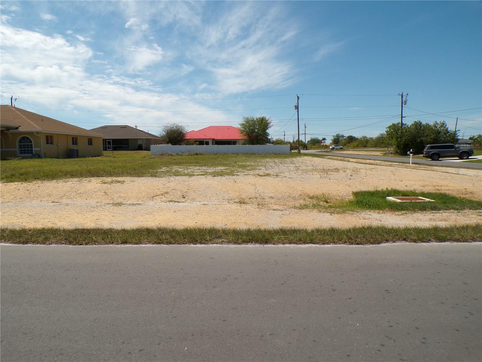 This Corner Lot presents a prime opportunity to develop on a multi-family lot in Cape Coral, situated within the highly sought after Flood Zone X, where flood insurance is not required. With city water, sewer, and irrigation already in place, this property is ready for development, making it a perfect choice for investors or those looking to generate rental income. Situated in a rapidly growing area, this lot offers convenient access to Pine Island Road, where you’ll find endless shopping, dining, and entertainment options. Just 18 miles to I-75, commuting is a breeze, while nearby attractions like Sun Splash Water Park, local golf courses, parks, and nature preserves provide plenty of recreation for residents. Cape Coral continues to be one of Southwest Florida’s most sought after markets, offering boating access, year round outdoor activities, and a vibrant community atmosphere. Whether you’re planning to build a duplex or expand your investment portfolio, this property presents incredible potential. Don’t miss this opportunity to secure a prime piece of Cape Coral real estate—priced to sell and ready for your vision! The seller has 3 other simlar lots listed at 1816 NE 8th Place, 821 and 825 NE 15th Lane.