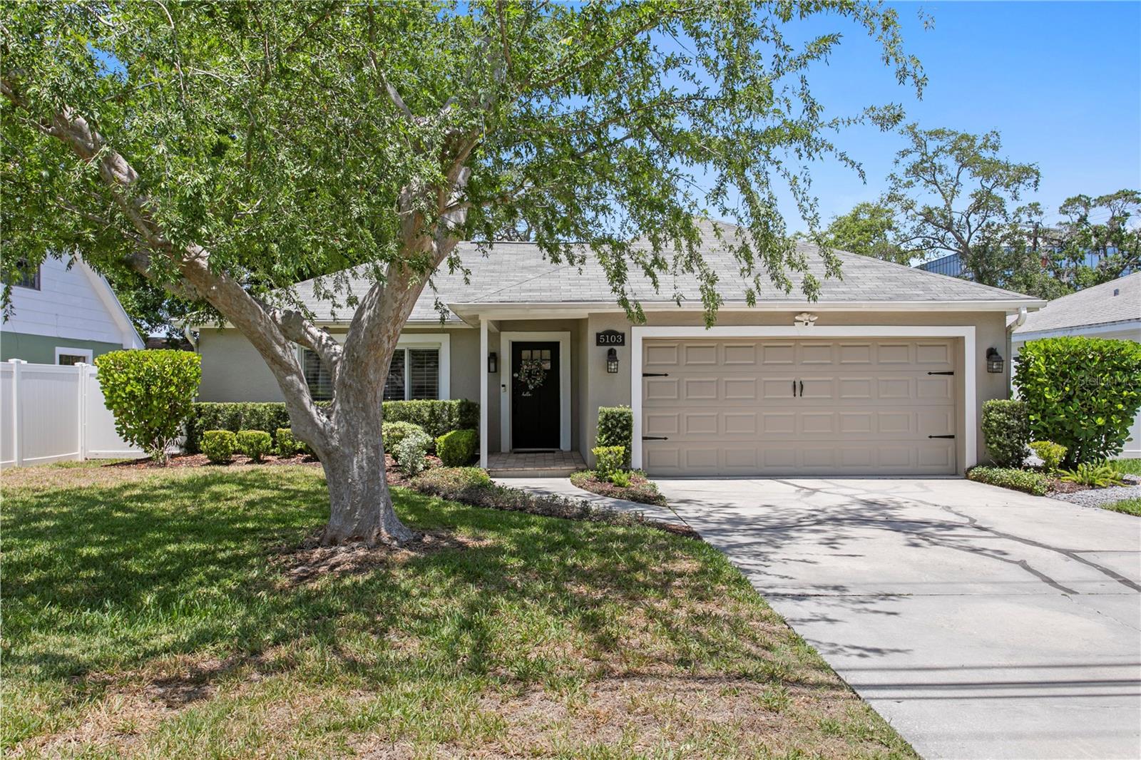 Welcome home to your completely updated, meticulously maintained and turn key, all block single story home in the heart of it all. This home was never flooded during either storm, and located in Beach Park, one of the best neighborhoods in South Tampa. Whether you want to go walk on Bayshore Boulevard, grab dinner in downtown Tampa, take a drive to the beaches, or run to the many grocery stores minutes away, this location is it. This three bedroom, two bathroom home with a large two car garage with storage and over 1,600 square ft, this home truly has the best floor plan and has so many upgrades throughout with many built in features. This home has timeless and thoughtful updates throughout including beautiful tile adorning the floors throughout with luxury vinyl in the bedrooms, newly renovated bathrooms, custom built pantry storage in the kitchen, Newer paint, newer plumbing faucets, cabinet hardware, and lighting fixtures throughout, newer stainless steel appliances (refrigerator with special ice feature, microwave, range/oven with air fry option, beverage fridge) are all under 3 years old, and can be controlled via app to make life easier. As you step inside, natural light pours in all directions, and this floor plan has so many options with its current function to be two different spaces between when you walk into the living room and kitchen, separated by drywall which can be easily removed if someone would want to make it more of an open concept living space for larger entertainment options. All three bedrooms and bathrooms are located in the back of the home with so much privacy and all include custom closets in each of the rooms. As you step outside, you'll find your private covered porch which overlooks a massive backyard which is fully fenced perfect for entertaining. Located in A+ School district, minutes from Tampa International Airport, quick access to I275, I-4, and Veterans Expressway.