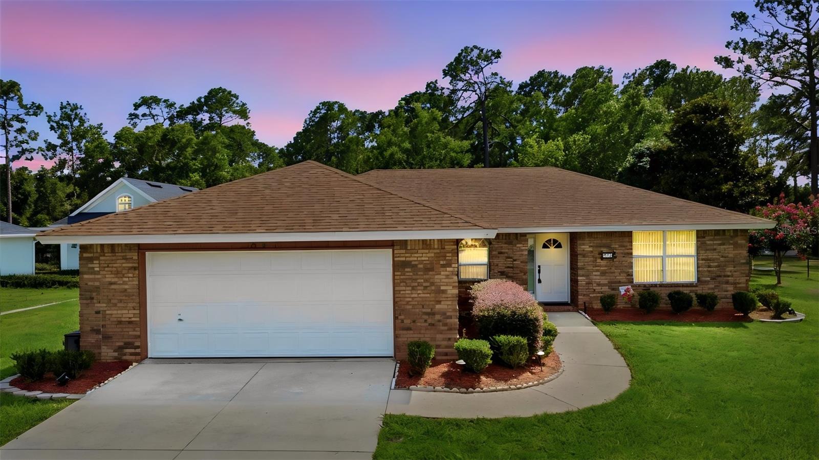 Located in the gated community of Lakeshore Trails, this 3-bedroom, 2-bath home offers a comfortable layout, important updates, and plenty of opportunity to add your own personal touches. With a roof replaced in 2017, a new A/C installed in 2024, and a security system already in place, some of the major items have already been taken care of. Enjoy the convenience of a short drive to downtown, shopping, dining, and major roadways, while still being tucked away from the hustle and bustle of city life. Step inside to a welcoming foyer that opens to the spacious living and dining areas, creating an inviting setting for everyone. The kitchen features abundant cabinet space, a built-in pantry, laminate flooring, and easy access to the garage. The split-bedroom floor plan offers added privacy, with a guest bedroom and full bath near the front of the home and a second bedroom tucked toward the back. The primary suite is located just off the dining area and includes a walk-in closet and private bath with dual sinks, a walk-in shower, linen storage, and a separate water closet. Sliding glass doors lead to a screened patio, providing a peaceful spot to enjoy your morning coffee or relax at the end of the day. Laundry is located in the garage and the washer and dryer stay! The community features a lake with Dock-bring your fishing rods! With a functional floor plan, generous storage throughout, and the opportunity to make it your own, this Lakeshore Trails home is ready for you.