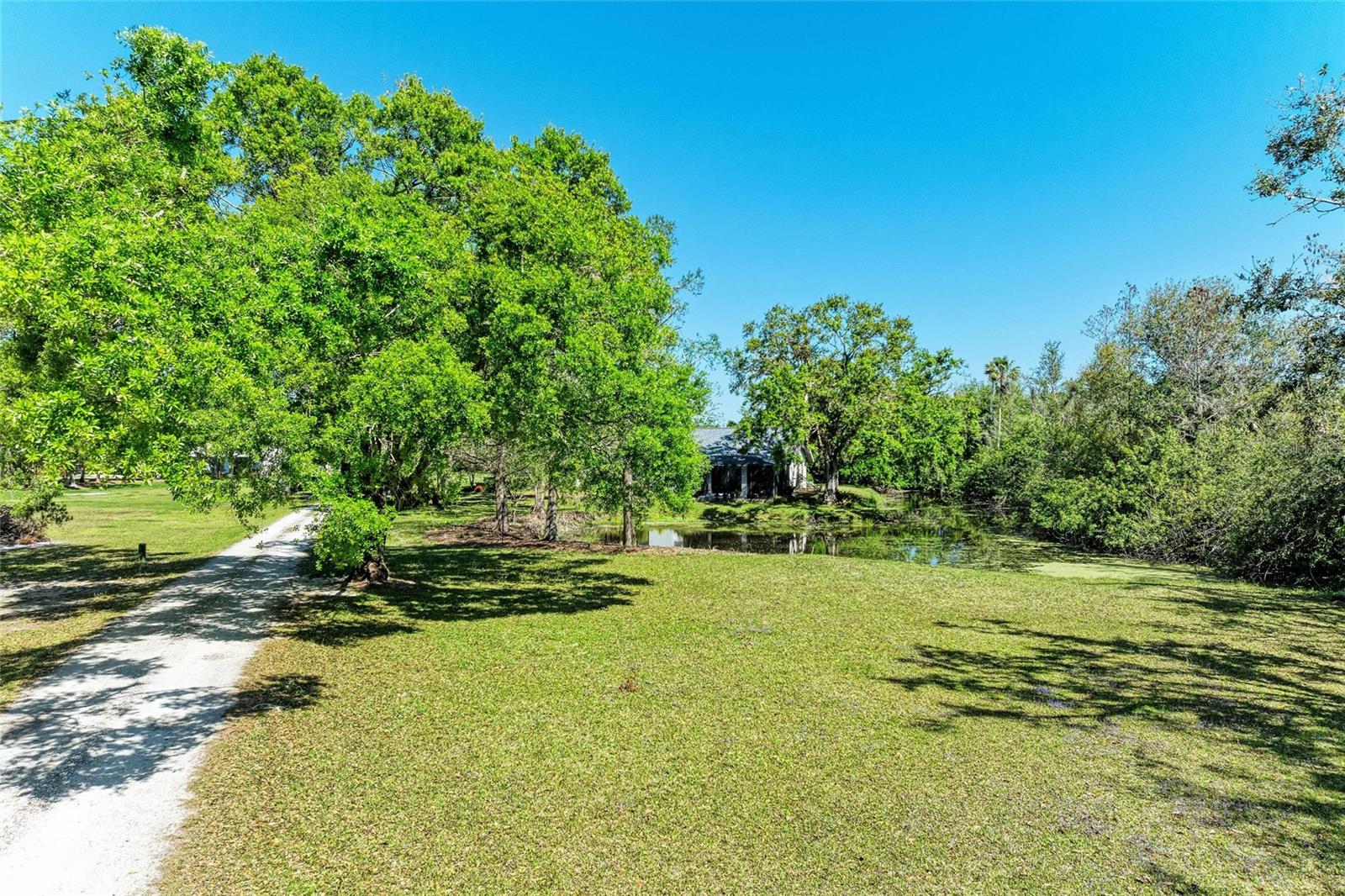 Exceptional opportunity to own 9.5 acres in a prime Bradenton location on 45th St E, just moments from 44th Ave E and Lockwood Ridge Rd. Zoned Agriculture and free of HOA restrictions, this property offers incredible flexibility for a private estate, equestrian use, or future investment.

The property currently includes a home on site, providing immediate use or the option to build new. With expansive acreage and a highly desirable location, this parcel presents a rare chance to create your ideal setting while still being close to everyday conveniences.

For those seeking additional space or development potential, this property can be combined with three adjacent parcels for a total of approximately 23 acres—an outstanding opportunity in a rapidly growing area.

Enjoy the best of both worlds with privacy and open space, while remaining just minutes from shopping, dining, and the Gulf Coast’s beautiful beaches.

Don’t miss this chance to secure a versatile and valuable piece of land in the heart of Bradenton!