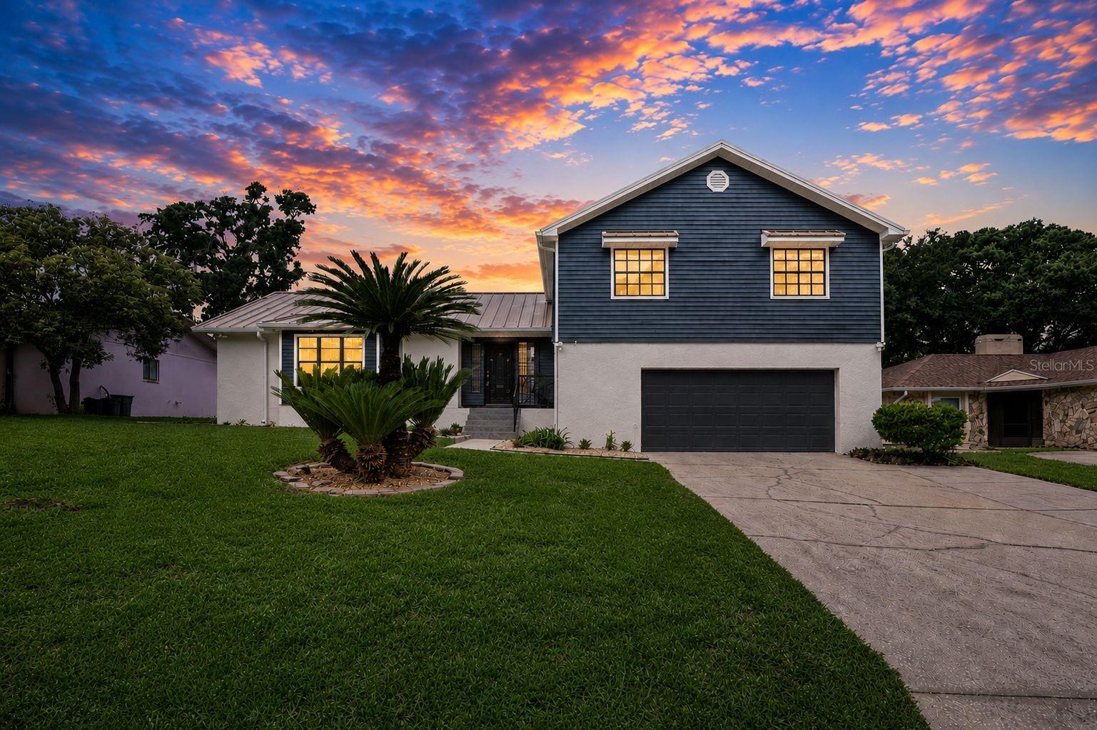 Welcome to 3829 Eric Court, a beautifully updated tri-level home located in the highly sought-after South Central Lakeland area. Offering 4 bedrooms, 3 full bathrooms, and multiple flexible living spaces, this move-in-ready residence combines modern updates with timeless charm in an exceptional location.Conveniently situated just minutes from Lake Hollingsworth, Lake Miriam Drive, Lakeside Village, shopping, dining, medical facilities, and major commuter routes, this home offers both comfort and convenience.Inside, you’ll find extensive upgrades throughout, including quartz countertops, luxury vinyl plank flooring, updated light fixtures, fresh interior and exterior paint, and a spacious 11 x 5 walk-in custom butler’s pantry that provides abundant storage and prep space with the numerous shelves/counter space/pull out drawers. The functional tri-level layout offers room for everyone, with a versatile bonus room that can easily serve as a home office, game room, media room, exercise space, guest suite, or multigenerational living area. The primary bedroom offers plenty of natural light, has a spacious walk-in closet and flows to the primary bathroom which has been compltely redone. There are no small bedrooms in this home as they are all big enough for all your furniture(sizes are: 12x12, 12x15,14x11).The spacious Florida Room located just off the kitchen expands the living area and creates the perfect setting for entertaining, relaxing, or enjoying views of the backyard throughout the year.Outdoor living is equally impressive with mature trees, established landscaping, garden space, a large deck, and a built-in grill with storage. The backyard offers plenty of space for entertaining, gardening, or simply enjoying Florida living.For added peace of mind, the home features a new metal roof installed in 2025, providing long-term durability and value.With its thoughtful updates, flexible floor plan, desirable location, and move-in-ready condition, 3829 Eric Court presents a rare opportunity to own a truly special home in the heart of Lakeland. Don’t miss this opportunity — schedule your private showing today or share this listing with your agent before it’s gone! **Click on the virtual tour button for a Matterport 360 degree immersive walkthrough tour of the home. Just like a 24/7 open house!