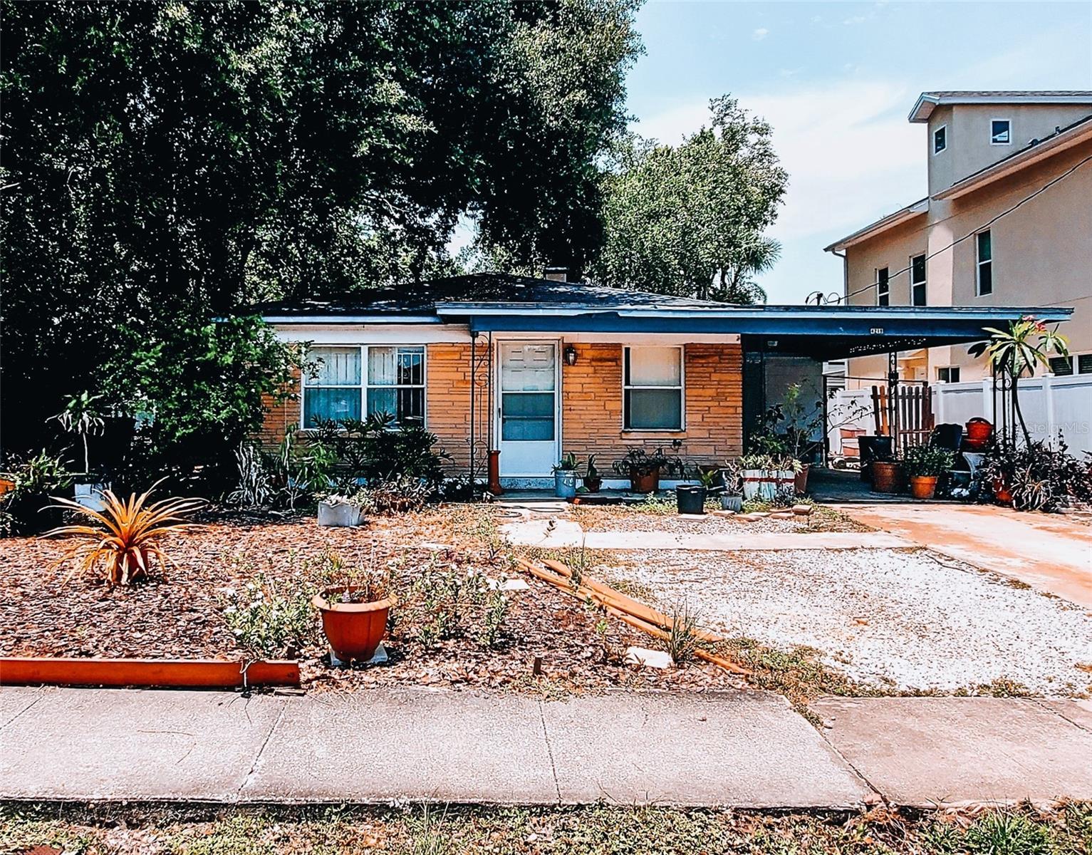 Cozy 3 bedroom, 1 bathroom starter home in an upward trending area near Tampa International Airport. The home needs repairs: roof, HVAC, and cosmetic upgrades throughout. The neighborhood also offers strong upside value potential to tear down and build new on this
5,000 sf lot zoned RS-50 Residential/Single Family.