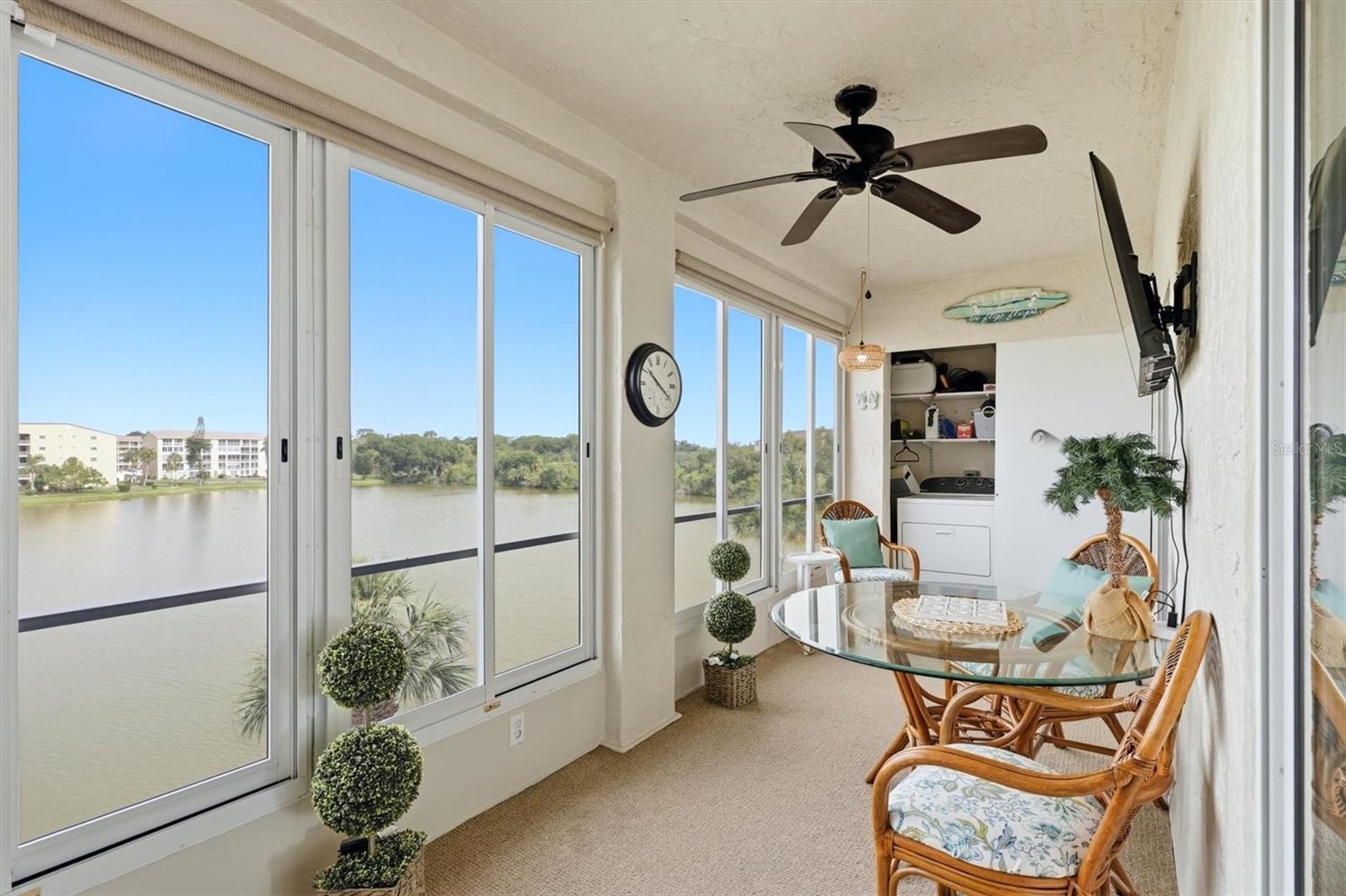 Enjoy easy Florida living in this beautifully updated 4th-floor condo, ideally located in a desirable 55+ community just minutes from Anna Maria Island, with LOW HOA FEES! Offering stunning water views and a light, coastal-inspired design, this move-in-ready home combines comfort, style, and convenience.

Inside, you'll find luxury vinyl plank flooring throughout, elegant quartz countertops, updated light fixtures, and a bright, inviting interior. The enclosed Florida room, complete with windows, provides the perfect space to relax and take in the peaceful waterfront scenery year-round. The spacious primary suite features a walk-in closet, while the in-unit washer and dryer add everyday convenience.

Major updates include a 2024 A/C and a 2019 water heater, giving you added peace of mind. Low HOA fees make ownership even more appealing and include cable and internet.

Residents enjoy fantastic amenities, including an active community calendar with numerous social events lined up each week. Other amenities include elevators, a HEATED community pool, clubhouse, shuffleboard courts, and a fishing dock. Whether you're looking for a full-time residence or a seasonal retreat, this waterfront gem offers the perfect blend of low-maintenance living and an unbeatable location just minutes from the beautiful beaches, dining, and shopping of Anna Maria Island.