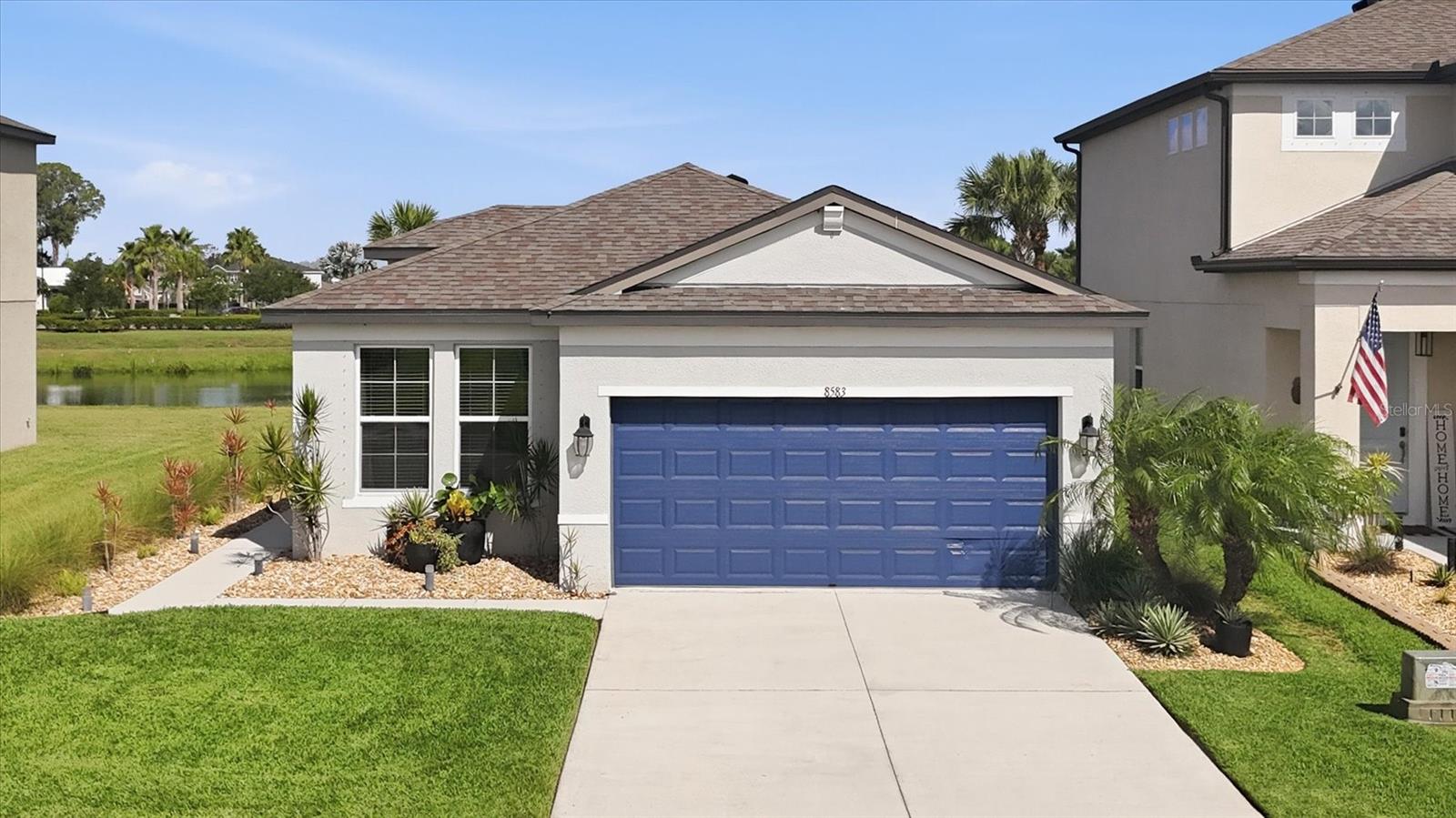 Positioned on a peaceful pond lot directly across from the community pool, this beautifully maintained 3-bedroom, 2-bath home is located in one of Parrish's desirable gated communities. Inside, you'll find an inviting layout designed for comfortable everyday living, complemented by modern updates, stylish accent walls, and abundant natural light. Large windows frame tranquil water views, creating a warm and welcoming atmosphere throughout the home. The kitchen features a reverse osmosis water filtration system, adding convenience and peace of mind. Whether you're enjoying your morning coffee overlooking the pond, relaxing by the pool just steps away, or entertaining family and friends, this home offers the perfect setting to enjoy the Florida lifestyle. Just a short golf cart ride away, you'll find restaurants, a coffee shop, Publix, and other local businesses, making everyday errands and dining out incredibly convenient. With easy access to major highways, top-rated schools, Lakewood Ranch, Bradenton, St. Petersburg, and Sarasota, this home combines peaceful neighborhood living with exceptional convenience.