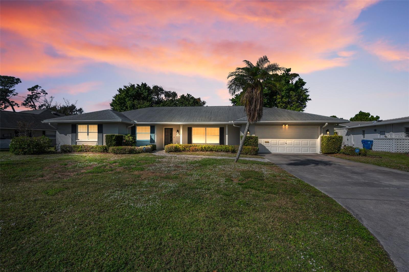 Welcome to this charming 3-bedroom, 2-bath home in highly sought-after Belleair Estates. The home is situated on the 9th hole of the Pelican Golf course, less than a 5 minute walk to Pelican and just 10 minute drive to the beautiful Belleair, Clearwater and Indian Rocks Beach. This well-maintained single-story residence offers a bright, open feel with abundant natural light, neutral finishes, and beautiful flooring throughout the main living areas. The spacious living room provides a welcoming setting for both everyday living and entertaining. Step outside to your private screened-in pool, perfect for enjoying Florida living year-round. The generous backyard offers a peaceful retreat with mature landscaping and plenty of space to relax or host gatherings. A two-car garage and wide driveway add convenience, while the home’s solid layout offers comfortable bedroom separation.
Located in a desirable, well-established neighborhood close to beaches, golf courses, shopping, dining, and top-rated schools, this home presents an excellent opportunity to enjoy the Belleair lifestyle. Don’t miss your chance to own in one of the area’s most coveted communities.