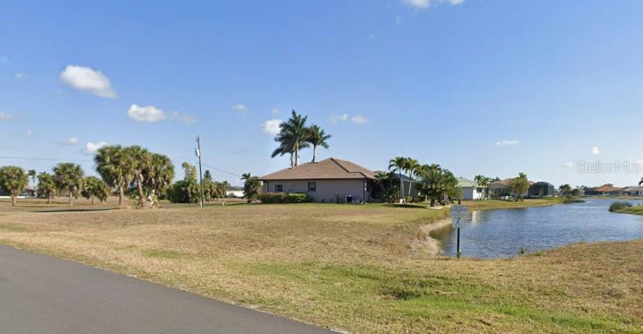 DISCOVER THE PERFECT PLACE TO BUILD YOUR FLORIDA DREAM HOME in the highly sought-after, deed-restricted community of Burnt Store Lakes. This oversized corner homesite enjoys peaceful water views, added privacy, and an ideal location within one of Punta Gorda's most desirable neighborhoods.

Residents of Burnt Store Lakes enjoy an exceptional lifestyle with community amenities including a lakeside park, playground, picnic pavilion, and a private kayak/canoe launch providing access to Charlotte Harbor for endless days of boating, fishing, and exploring Southwest Florida's waterways.

Located adjacent to Burnt Store Marina, you'll have convenient access to one of the area's premier boating destinations featuring full-service marina facilities, boat storage, waterfront dining, and a 27-hole executive golf course.

Just a short drive away, historic downtown Punta Gorda offers a vibrant waterfront atmosphere filled with locally owned restaurants, boutique shopping, art galleries, weekly farmers markets, and year-round festivals and community events. Enjoy miles of scenic walking and biking paths that wind along Charlotte Harbor, or spend the afternoon at nearby Fishermen's Village with its waterfront restaurants, unique shops, marina, and entertainment.

Whether you're looking for a peaceful homesite, an active boating lifestyle, or easy access to everything Southwest Florida has to offer, this exceptional property places it all within reach.