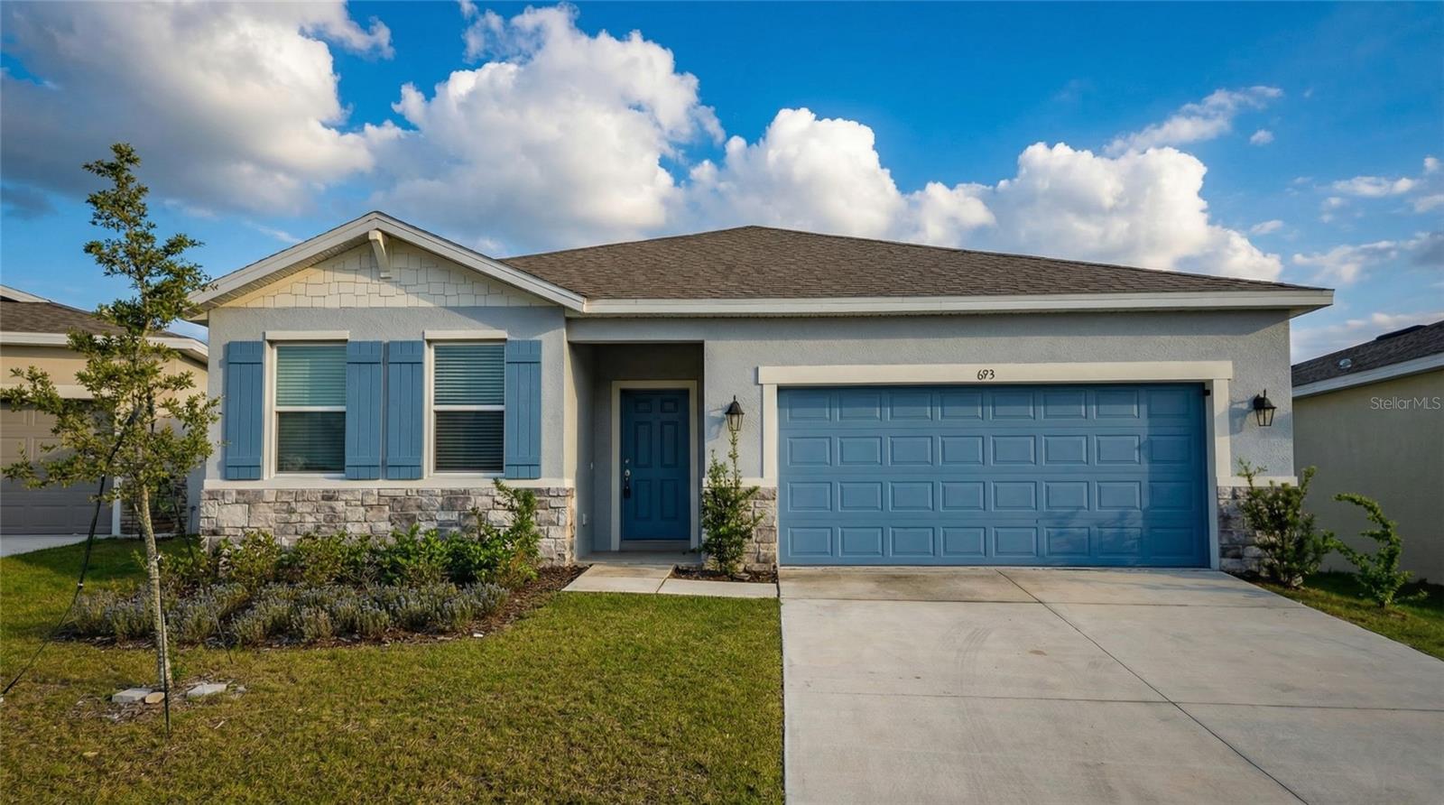 One or more photo(s) has been virtually staged. Why choose between work and play when you can have both? Welcome to your fully upgraded sanctuary in Eagle Lake, perfectly situated for the modern Central Florida lifestyle between Orlando and Tampa. Why wait for a basic new construction build when this home comes loaded with premium features you can enjoy on day one?

This spacious 2,236 sq. ft. single-story home offers a level of finish that sets it apart from the competition. Step out back to your extended, fully screened-in lanai, allowing you to enjoy the Florida breeze year-round without the worry of insects. The outdoor oasis continues with a fully fenced backyard for total privacy and beautifully paved outdoor areas perfect for barbecues and entertaining.

Inside, the attention to detail is unmatched. Say goodbye to basic wire shelving—this home features custom built-in closet systems, maximizing storage and organization in the bedrooms. The smart split floor plan is designed for families who need room to breathe, featuring a massive Primary Suite at the rear, plus a separate Guest Suite with its own full bathroom at the front entrance—perfect for visiting in-laws or independent teenagers.

Enjoy the best of Eagle Lake: You are just minutes from the Chain of Lakes for boating and fishing, 15 minutes from Legoland, and less than an hour from Disney World. Don’t settle for a construction site when you can own this upgraded, turn-key home with custom closets and a finished backyard. Schedule your tour today!