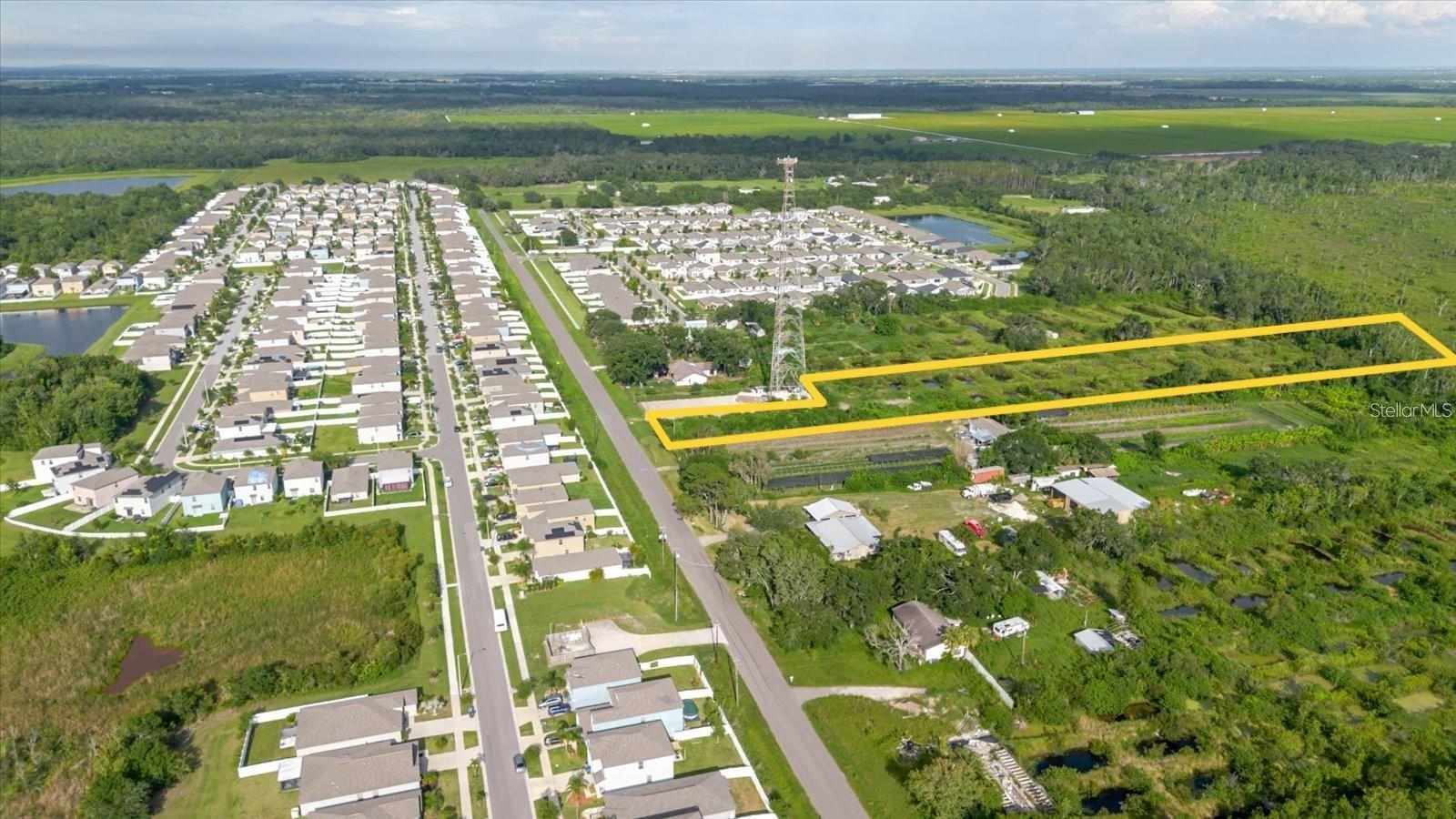 Exceptional opportunity to own approximately 4.8 acres of high-potential land with no HOA, no CDD, and no restrictions—bring your vehicles, equipment, RVs, and more. With the possibility of rezoning to allow up to four single-family homes per acre, this property is well-suited for residential development or a private estate. Ideal for car enthusiasts, contractors, or anyone seeking space and flexibility, the property offers public water and sewer connections at the front. The rear portion was previously used as a fish farm, presenting potential for income generation or repurposing into agriculture, greenhouses, or a self-sustaining garden. Whether you're planning to build your dream home or invest for the future, this property offers endless possibilities. Conveniently located with direct road access and close to Tampa, Sun City, Brandon, Wesley Chapel, and major highways including US 98, US 301, I-4, and I-75. Zoned Agricultural Residential (AR), this is a rare and versatile offering. Please note: a cell tower is located on-site but sits on a separately deeded parcel and was sold previously (documentation available upon request). Don’t miss this unique opportunity, contact us today for more information.