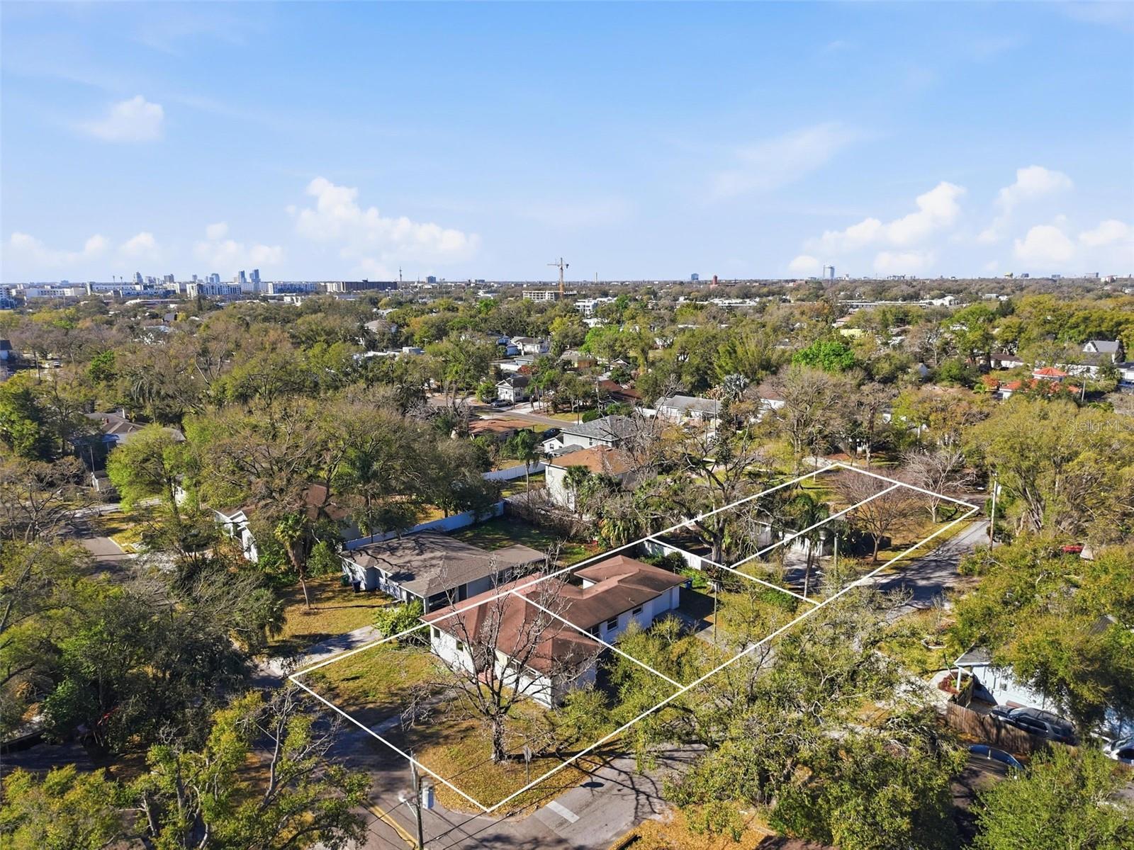 Four-lot assemblage totaling approximately 24,257 square feet across two adjacent addresses — 2725 N Myrtle Avenue and 2812 N Munro Street — in Riverside Heights, approved under City of Tampa Formal Decision No. FDN26-4, executed December 22, 2025. All four parcels are zoned RS-50.

Parcel A is a corner lot with approximately 65.62 feet of frontage on West Warren Avenue and 76.25 feet of depth along North Munro Street, containing approximately 5,000 SF. Parcel B is an interior lot with approximately 58.38 feet of frontage on West Warren Avenue and 76 feet of depth, containing approximately 5,000 SF. Parcel C is a corner lot with approximately 50 feet of frontage on North Myrtle Avenue and 140 feet of depth along West Warren Avenue, containing approximately 7,012 SF. Parcel D is an interior lot with approximately 50 feet of frontage on North Myrtle Avenue and 145 feet of depth, containing approximately 7,245 SF.

Design Exception 2 applications are in process for Parcels A and B, seeking to reduce setbacks to 15 feet front, 15 feet rear, 6 feet on each interior side, and 5.25 feet on the corner yard for Parcel A.

Full boundary, tree, and topographic surveys are available for all four parcels along with completed arborist reports and the executed Formal Decision. Each address carries an existing structure in good condition — photos available upon request — both conventionally financeable and currently leased at approximately $2,500/month each. Seller is open to an extended closing to allow a buyer to permit prior to closing.

Parcels A and B may be purchased separately. Parcels C and D will not be sold independently of Parcels A and B.