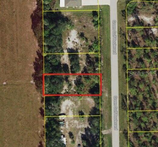This flat nice size lot is in Tropical Gulf Acres and has enough room for a large home with a pool. This is a great place to build your dream home and retire or raise your family. Bissett Park is a great county ran community park within this neighborhood with tennis, basketball, shuffle board courts, horseshoe area, picnic, playground and waterfront area. Less than 4 miles to I75 makes this location an easy commute to almost anywhere, and only 9 miles Punta Gorda Historic district and waterfront park with lots of shopping and dining options.