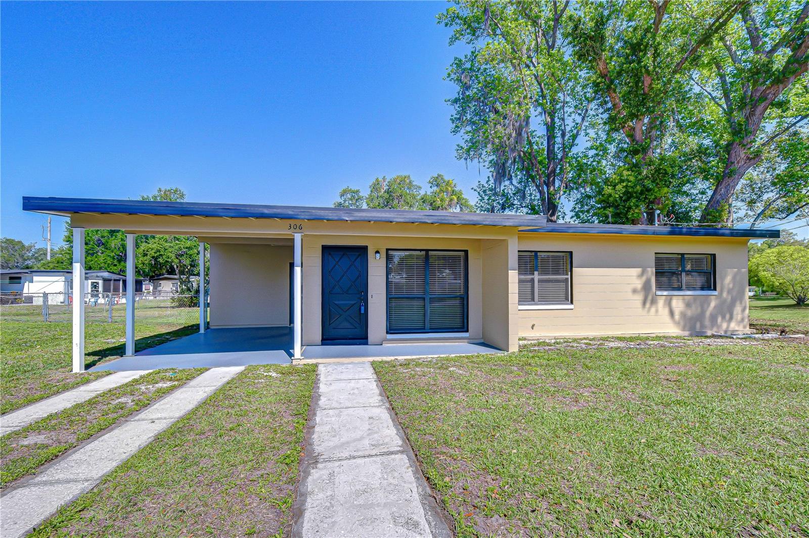 Get ready to fall in love with this charming Plant City home, perfectly located just minutes from major shopping, dining, and easy access to I-4. Situated on a beautiful .26-acre corner lot, this property offers the freedom of NO HOA or CDD, giving homeowners flexibility and peace of mind. Inside, you’ll find three spacious bedrooms and a beautifully remodeled bathroom. A light-filled great room welcomes you upon entry, seamlessly connecting to the dining area and kitchen—creating an inviting space for both everyday living and entertaining. Step outside and imagine the possibilities—this oversized lot offers plenty of room to design your dream outdoor living space, store your toys, or simply enjoy the extra breathing room that’s hard to find. Conveniently located within walking distance to the well-known Southern Hospitality Furniture store and just minutes from Publix, Plant City High School, and Route 39, this home combines comfort, location, and lifestyle all in one.