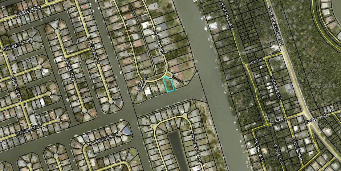 Escape to your private waterfront Sanctuary. This premier 95-foot wide homesite is nestled within The Sanctuary—an exclusive, gated island community of magnificent estates. Experience the perfect blend of luxury and convenience with direct saltwater canal frontage, located just 400 feet from the Intracoastal Waterway. Enjoy the serenity of canal-side docking, free from the heavy wake and traffic of the ICW, making every boat departure effortless. (Serious boaters take note: this lot offers the ultimate "easy in, easy out" docking experience - you get all the proximity to open water without the constant chop and hull wear of ICW traffic.)  
From the moment you cross the private bridge, you’re greeted by a landscape of mature oaks, tranquil fountains, and abundant wildlife. Enjoy paved jogging/biking trails, guard-gated security, and a lush, park-like atmosphere.  With no time limit to build and the freedom to choose your own builder and low HOA fees, this is your rare opportunity to design a custom Florida masterpiece.