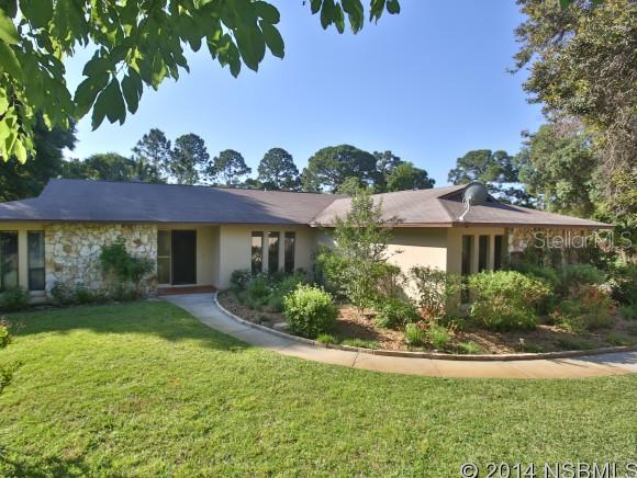 This beautiful pool home has been remodeled and is move-in ready.  Very private and peaceful, beautifully landscaped, sprinkler system. Eat-in kitchen, formal dining room, fireplace, gourmet kitchen with island.  Tiled floors.  Inside laundry room.  Open floor plan with bay window in living room.  Nice enclosed porch overlooking pool and fenced backyard.