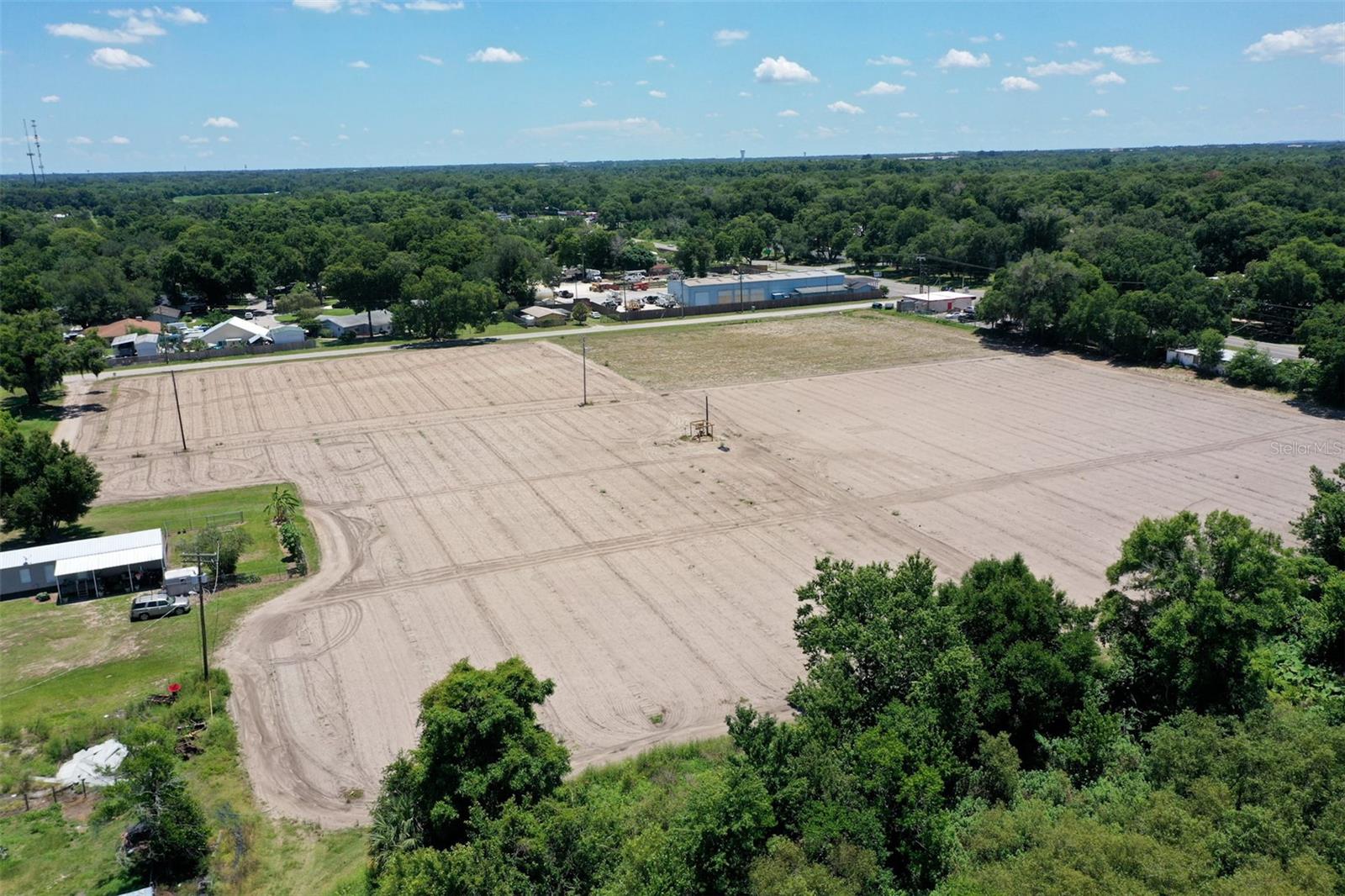Beautiful 52+ acres directly off highway 92 and access to I4 from Branch Forbes rd. The current property is equipped with 3 deep water wells 4" 6" and 10" for the farmed area. it also includes 3 home wells and 4 septic tanks. currently all tenants including farm lease are willing to stay on property if wanted by future owner. Call directly for more information in regard to income generated on the property.