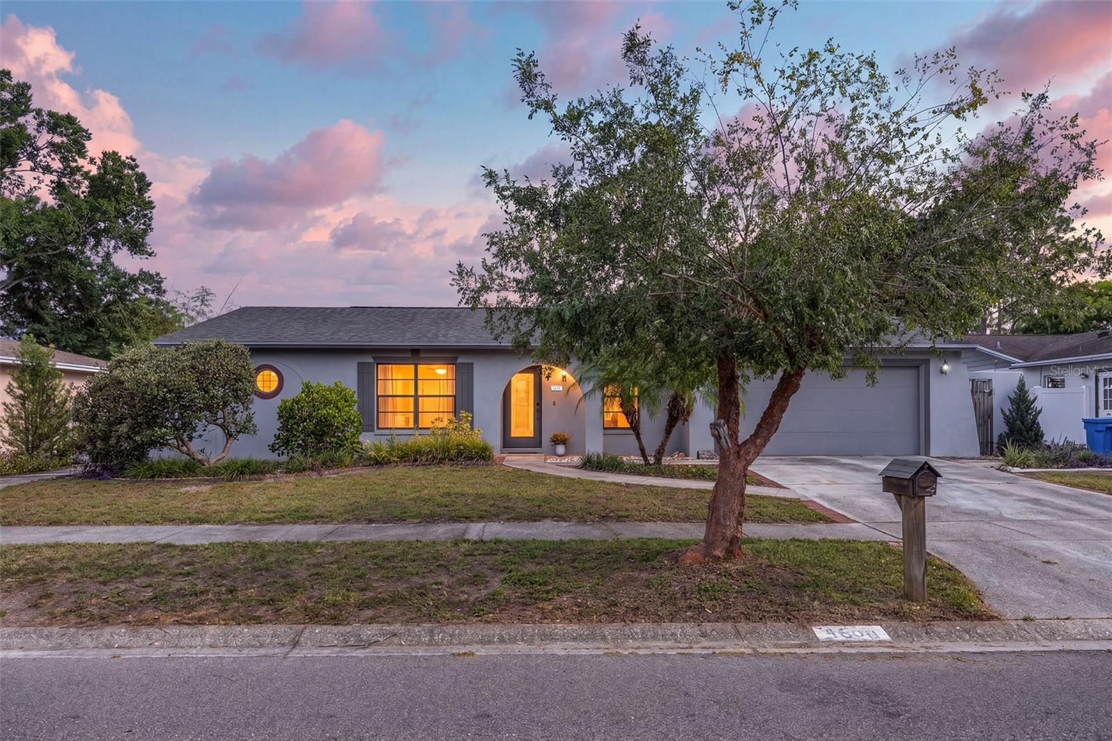 Welcome home to this amazing pool oasis in the heart of Northdale!  At almost a 1/4 of an acre, the s property features the most beautiful backyard pool oasis complete with a gazebo, deck, shed, fenced in yard and oversized covered screened lanai!  You enter through the front foyer and are flanked on both sides by a bright and airy living room and dining room boasting hard wood floors!  The kitchen is perfectly placed with upgraded appliances, fresh backsplash and an island designed for prep and entertaining that overspills into the family room and dinette overlooking the pool and yard.  The split floor plan is perfect for a large family with spacious bedrooms and upgraded full baths.  The laundry room is massive with storage, counter space and a sink.  Enjoy evenings poolside, tinker in the work shed while in your very own privately fenced backyard or decide to take a stroll to Country Place Recreation Park for the basketball/tennis courts, park and playground!