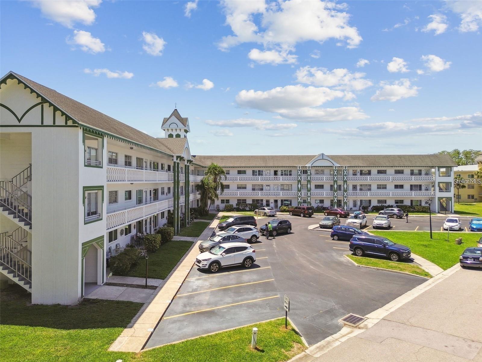 Welcome to this Charming TOP FLOOR unit! Which Eliminates any flooding issues! And No Neighbors above you. This FULLY FURNISHED 2 Bedroom/2 Bath Unit in a PET FRIENDLY building in On Top of the World, a 55+ Gated community located in the Heart of Clearwater just outside of DUNEDIN. This Desirable TOP Floor unit comes with a Reserved Parking Spot right in front on the Building. This Unit Features a Beautiful UPDATED Kitchen with Gorgeous Counter Tops and Custom Built Cabinets. Located just footsteps from the Trail and the Golf course! Featuring Luxury Custom tile throughout the living room. This unit Features Stainless Steel appliances and LED lighting. Updated Impact Windows, a Big Florida Room with great views of Courtyard that can be used as a Guest/3rd Bedroom. The Primary Bedroom features a Canopy bed for your comfort with an Ensuite Bathroom and a Newer A/C. This community has 2 Activity Centers. The amenities offered here are Amazing! This is your perfect year round living with FREE 18 & 9 hole Golf course, 4 Tennis courts, 2 Pools, One Heated, Shuffle board courts, PICKLE BALL Courts and different clubs to join within the community at NO additional cost!! Tons of activities and social events and so much more, the list of Amenities is Endless, you will never be bored living here!The remodeled Cardio Gym has the latest Exercise Equipment. A Very Pet-Friendly community, there is a fenced dog park with covered seating. There are hobby studios and a woodshop for the exclusive use of the residents. Activities include fitness classes, Dancing, clubs, Cards, Billiards, entertainment, classes, and much more. The on-site Good Karma Café has snacks and take-n-bake meals. The Rent INCLUDES almost Everything Even Your CABLE And INTERNET! Located in the heart of Clearwater, you are only Minutes away from the Nation’s Top rated Beaches. When you want to venture out, you are just 15 minutes from the beautiful sands of Clearwater Beach and 5-10 minutes from the charming village of Dunedin that has great Shopping, Dining, and Festivals and Honeymoon Island! Just a few Minutes away from the New PICKLEBALL COURTS in DUNEDIN! Make an appointment today!